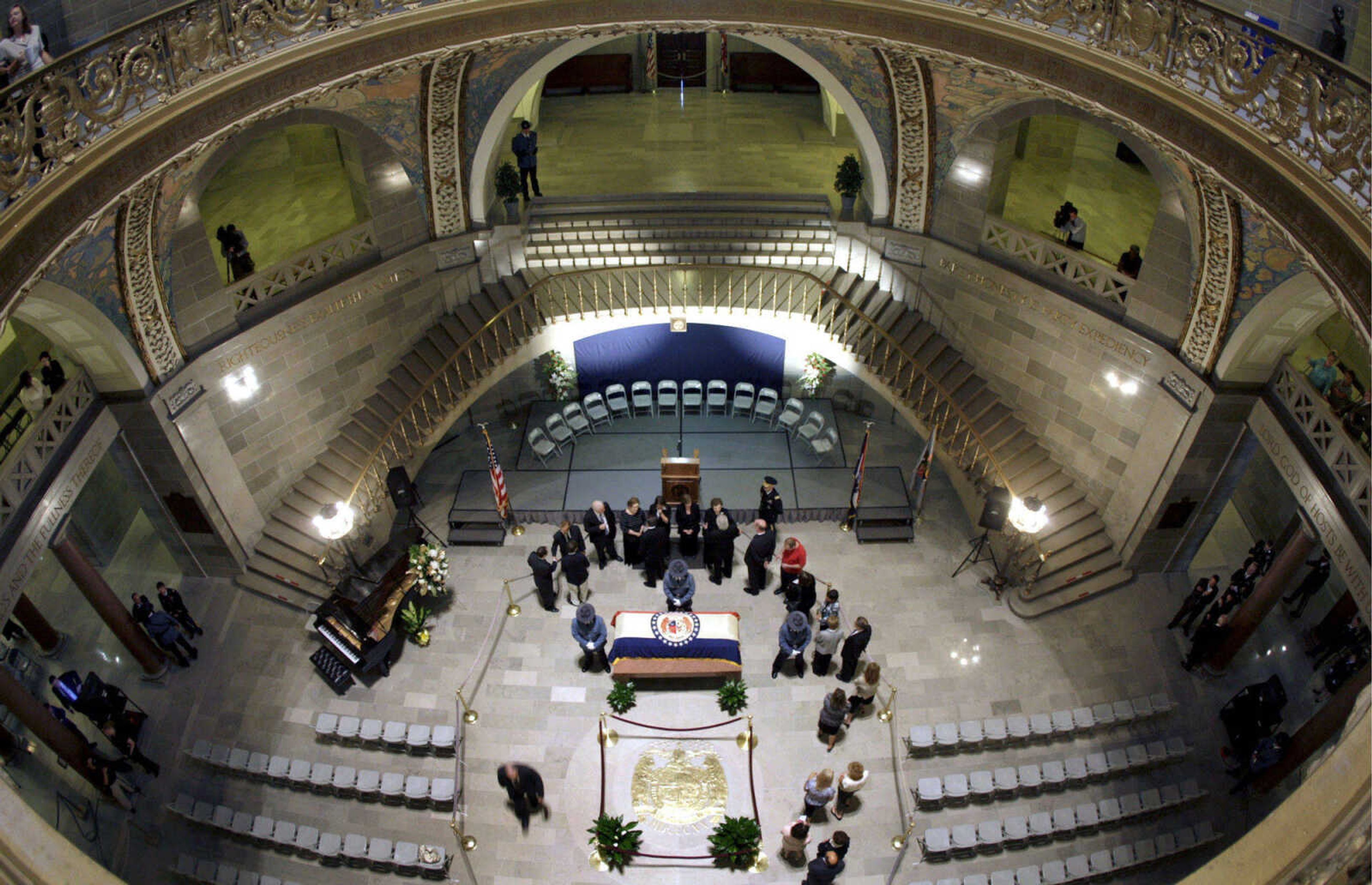 A line of mourners pay their respects as former Gov. Warren Hearnes lies in state in the Missouri Capitol Rotunda during a public viewing Wednesday, Aug. 19, 2009, in Jefferson City, Mo. Hearnes, who from 1965 to 1973 was the first Missouri governor to serve two full consecutive terms in office, died late Sunday night at the age of 86 at his home in Charleston. (AP Photo/Jeff Roberson)