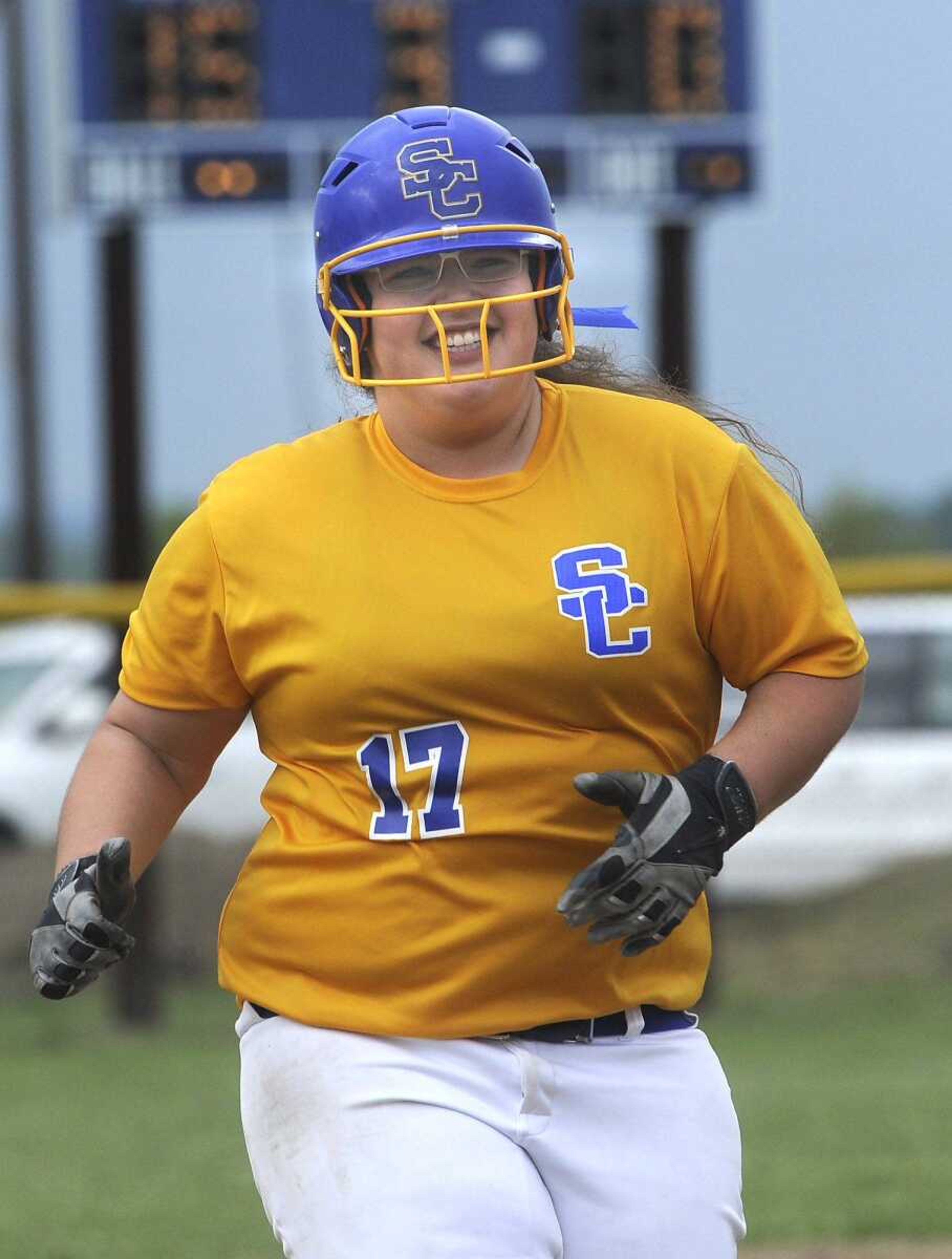 Scott City's Jamie Glastetter leaves the field after her game-ending double in the third inning to defeat Woodland 15-0 in a semifinal of the Class 1 District 4 softball tournament Tuesday, May 5, 2015 in Scott City. (Fred Lynch)