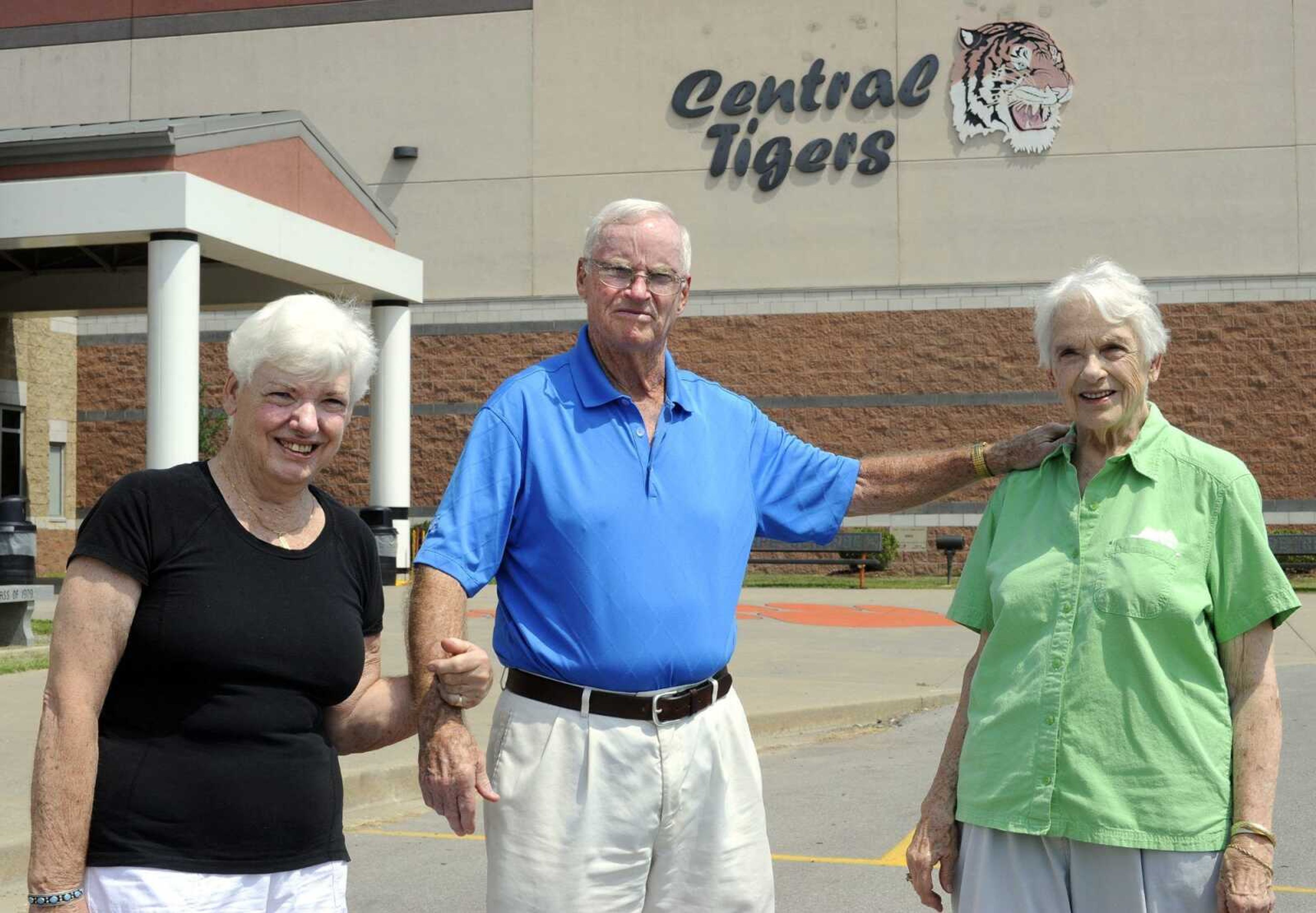 Barbara Gorski, left, and her siblings, Jack Litzelfelner and Phyllis Vickrey, stand Saturday in front of Central High School. Their mother, Ethel Marie Masterson, was one of four students in the first graduating class of Cape Girardeau High School in 1912. FRED LYNCH flynch@semissourian.com