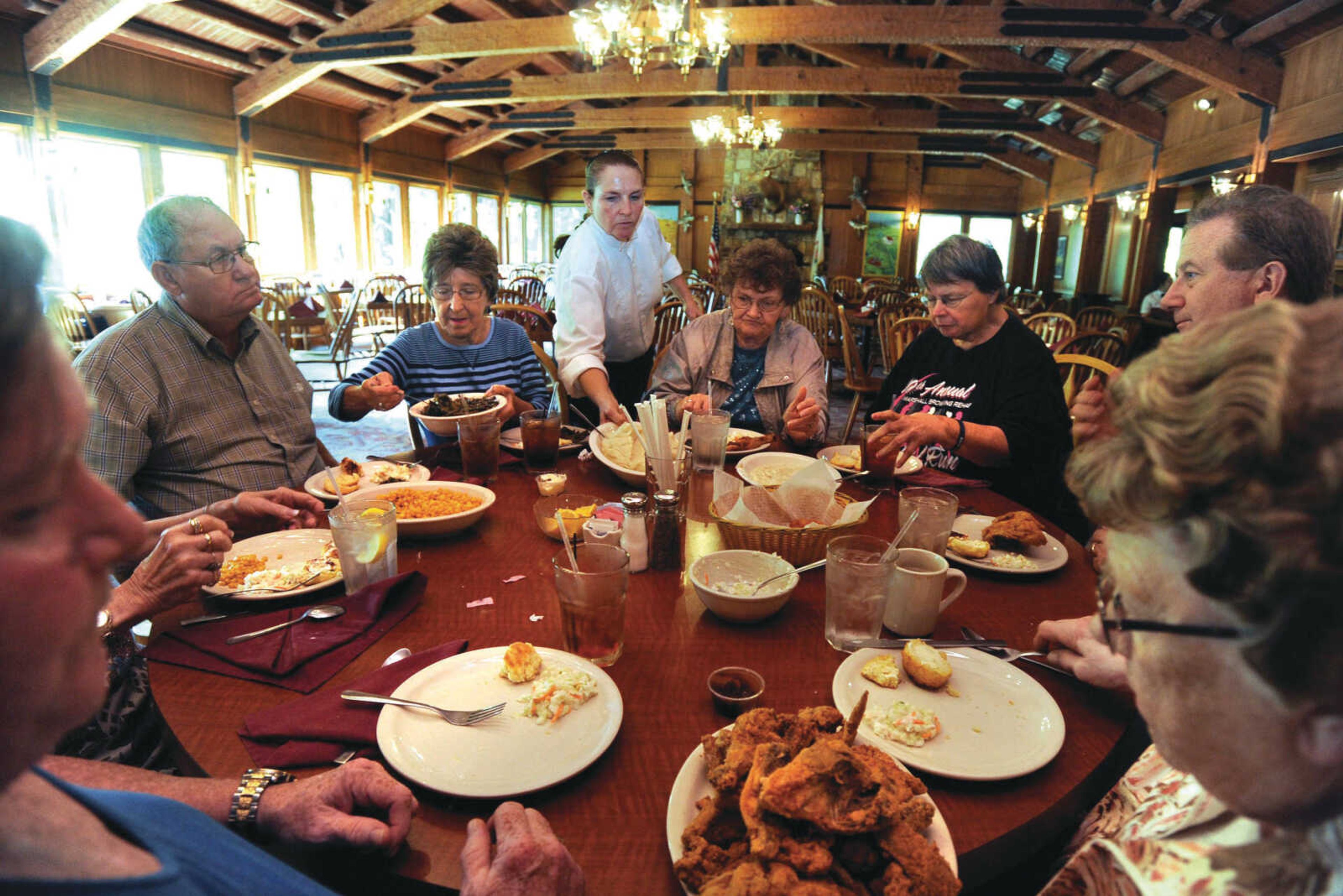 Jennie Stein serves guests in the dining room at Giant City Lodge on Sept. 8, 2017 in Makanda, Illinois.