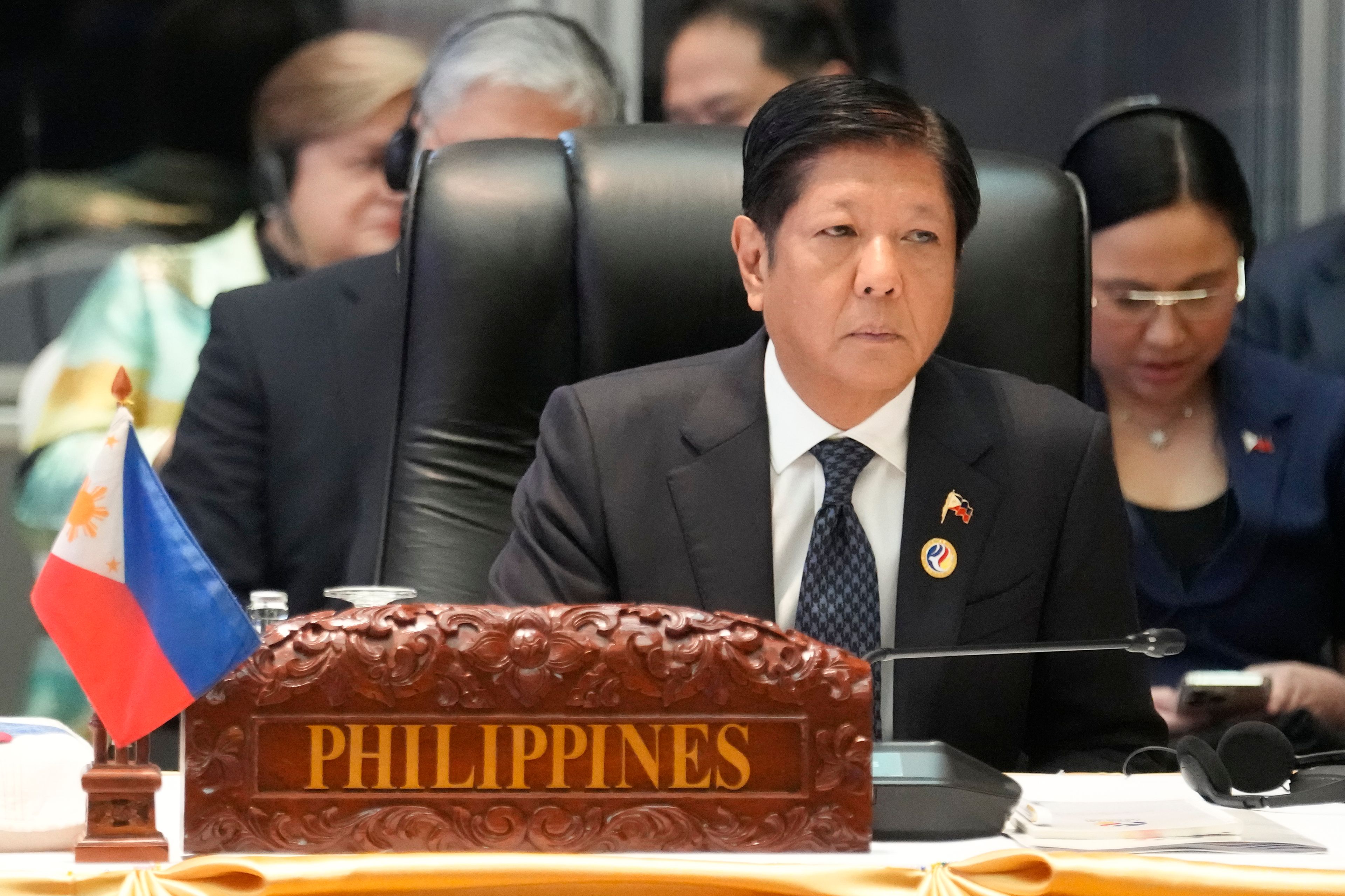 Philippine President Ferdinand Marcos Jr. listens during the 12th Association of Southeast Asian Nations (ASEAN) -U.S. Summit in Vientiane, Laos, Friday, Oct. 11, 2024. (AP Photo/Sakchai Lalit)