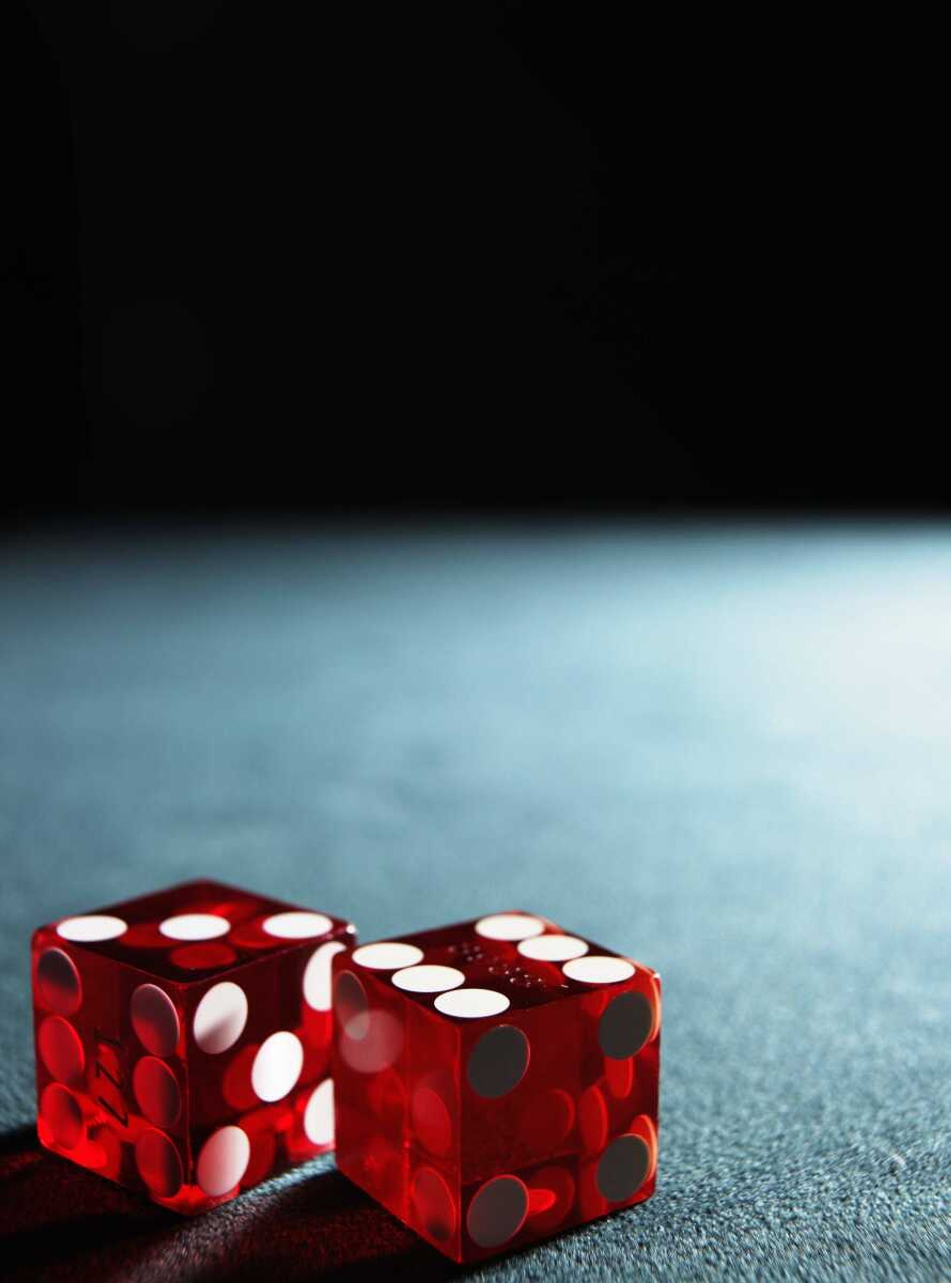 Red dice on table