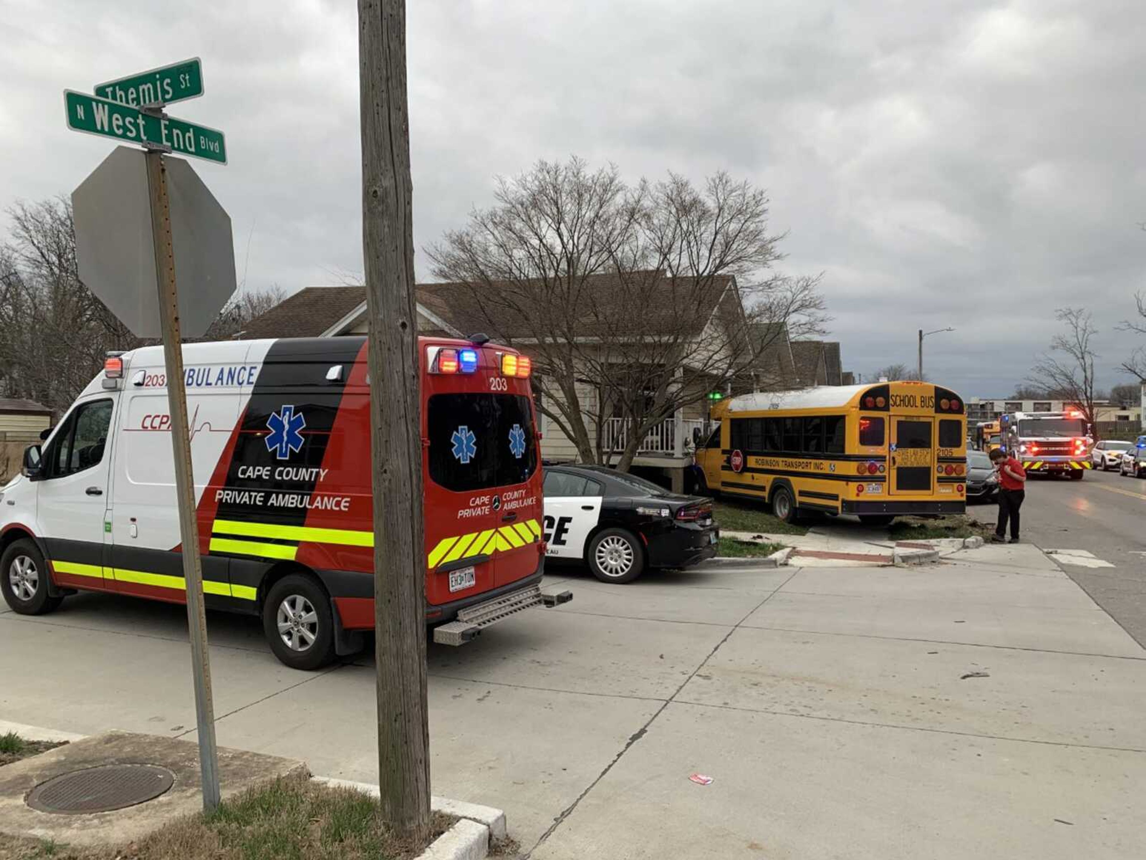 A Cape Girardeau Public Schools bus, in an accident involving another car, came to a halt up against a house Thursday afternoon, March 2, on the corner of Themis Street and North West End Boulevard in Cape Girardeau.