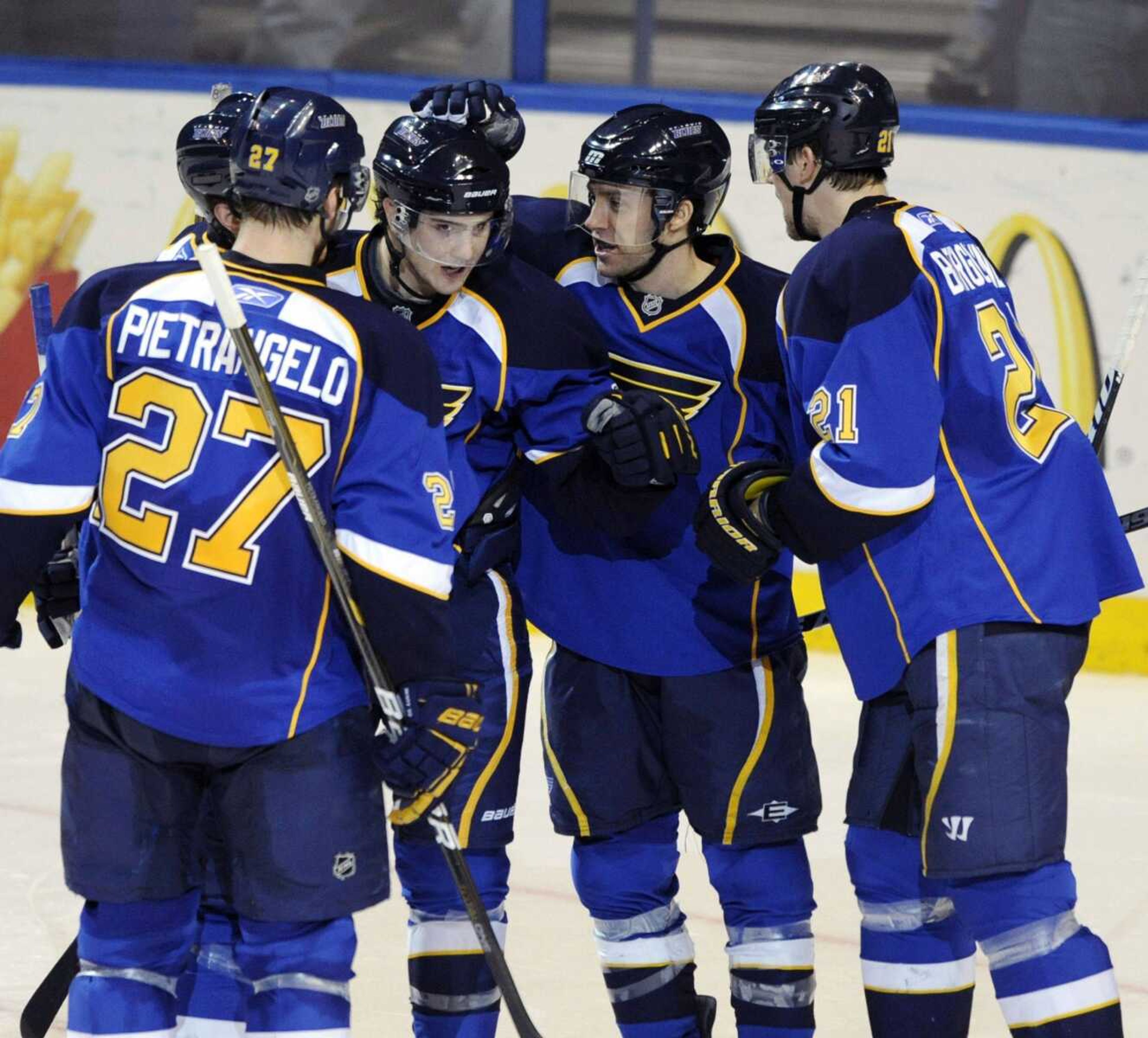 St. Louis Blues' Chris Stewart, second from left, is congratulated by teammates Alex Pietrangelo (27), Patrik Berglund (21), of Sweden, and Andy McDonald, second from right, after his goal against the Anaheim Ducks' in the second period of an NHL hockey game, Saturday, Feb. 19, 2011, in St. Louis. The Blues won 9-3. (AP Photo/Bill Boyce)