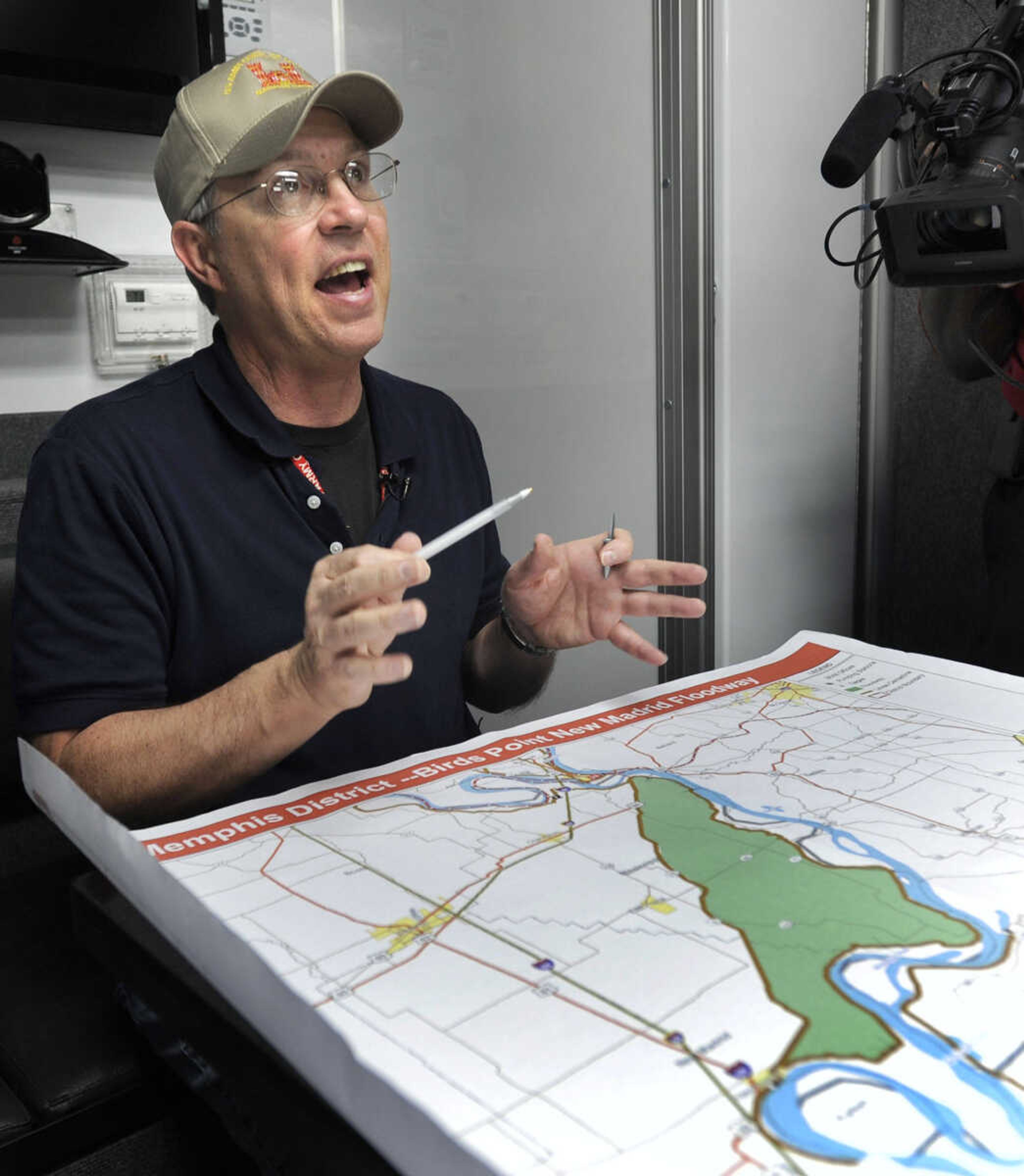 FRED LYNCH ~ flynch@semissourian.com
Jim Lloyd, operations team leader with the U.S. Army Corps of Engineers, speaks to news media Friday, April 29, 2011 at the Corps' command center near the Birds Point levee in Missouri's Mississippi County. Lloyd pointed out on a map of the Birds Point New Madrid Floodway the spots where explosives would be detonated in the levee if the order is given to blow the levee.