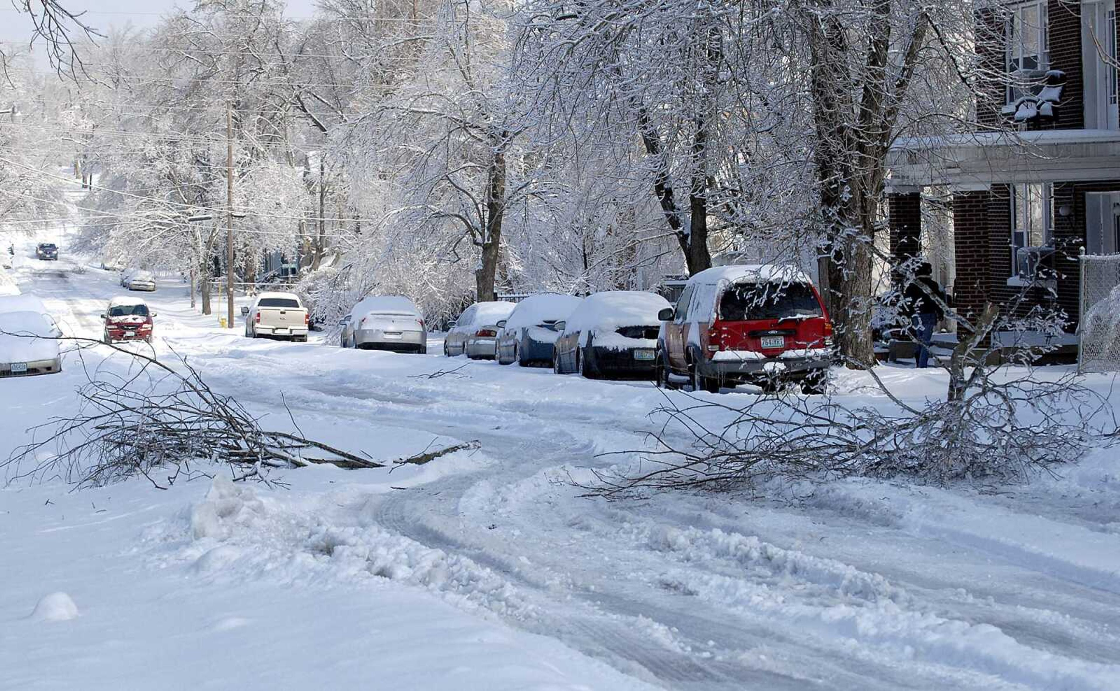 ELIZABETH DODD ~ edodd@semissourian.com
Branches litter Lorimier Street near William Street Wednesday morning.