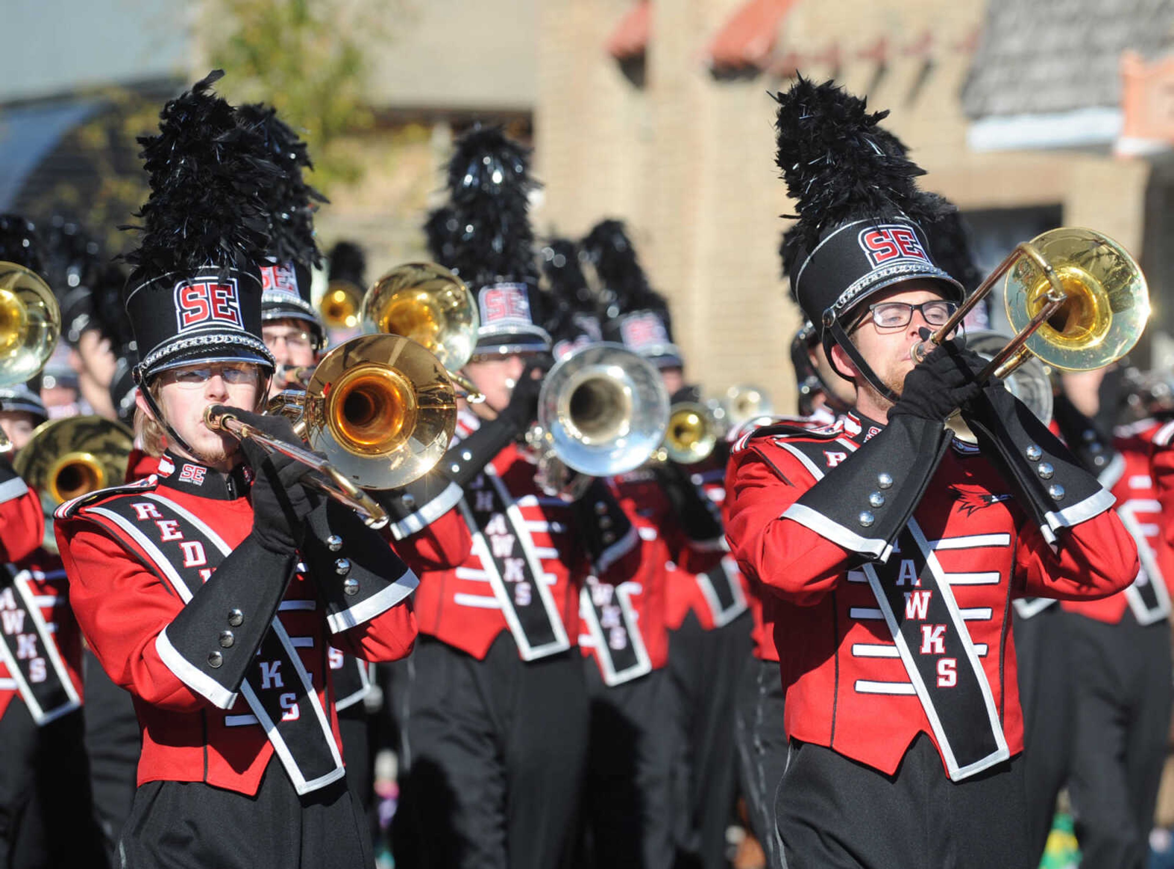 GLENN LANDBERG ~ glandberg@semissourian.com

The Southeast Missouri State University homecoming parade moves down Broadway St. in Cape Girardeau Saturday Morning, Oct. 4, 2014.