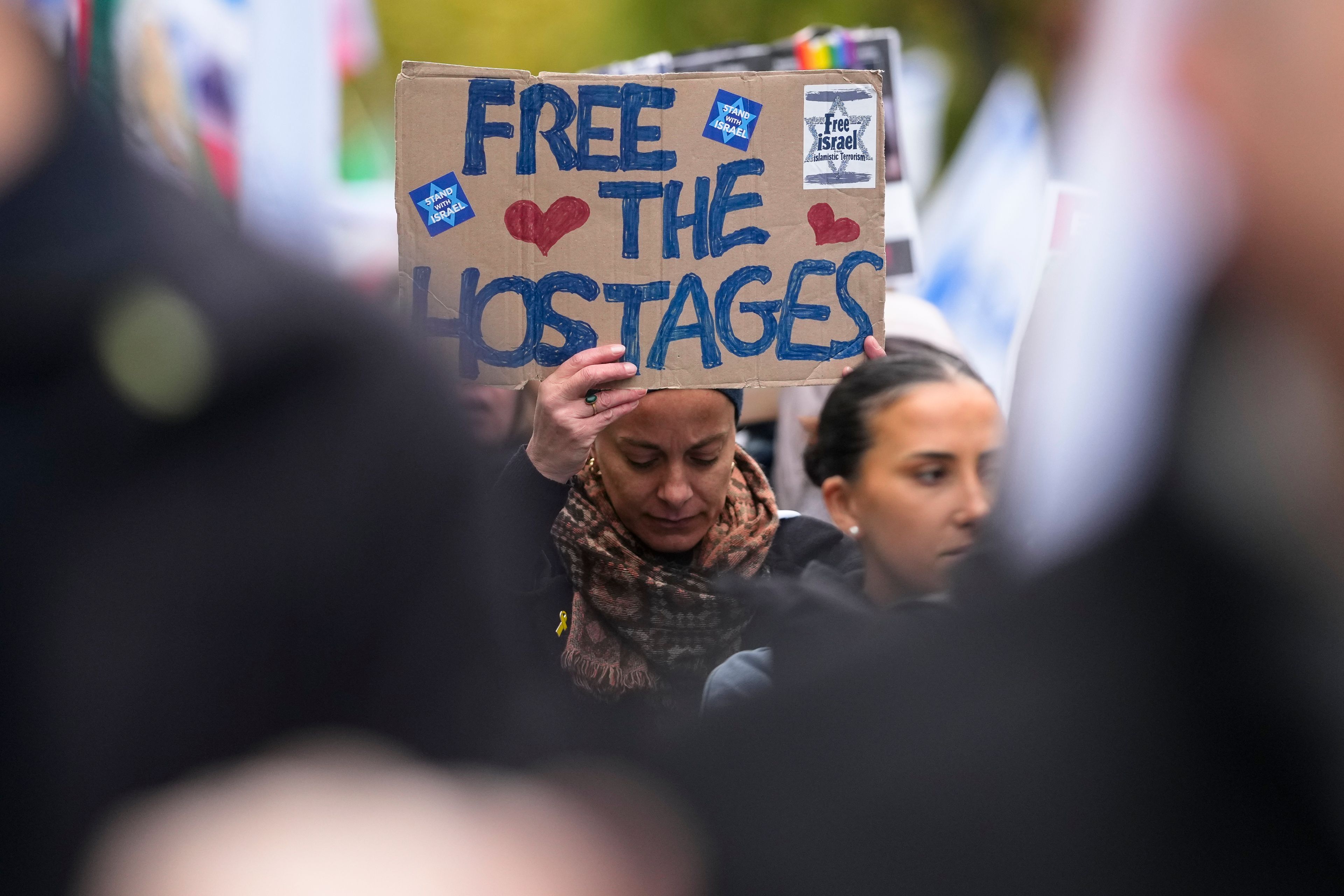 People attend a demonstration in support of Israel to mark the first anniversary of the Hamas attack on Israel, in Berlin, Germany, Sunday, Oct. 6, 2024. (AP Photo/Markus Schreiber)