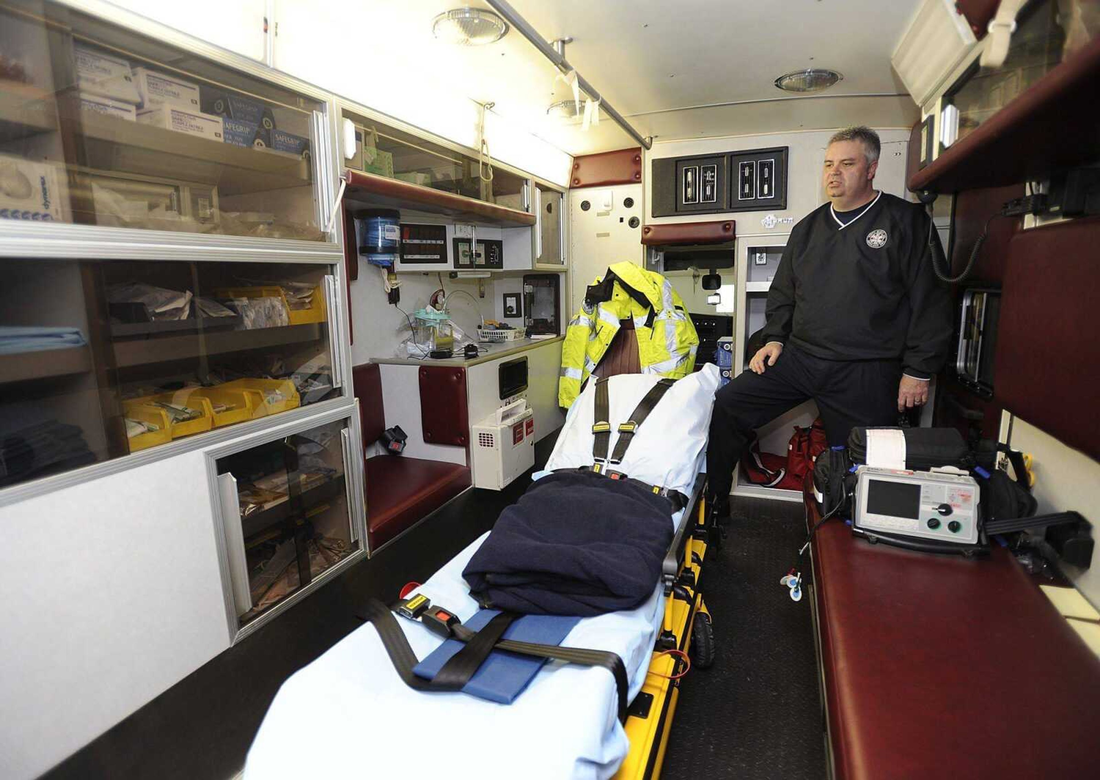 Larry Chasteen, director of the North Scott County Ambulance District, shows the inside of an ambulance at the Chaffee, Mo. station. The district faces a cut in Medicare reimbursement rates. (Fred Lynch)