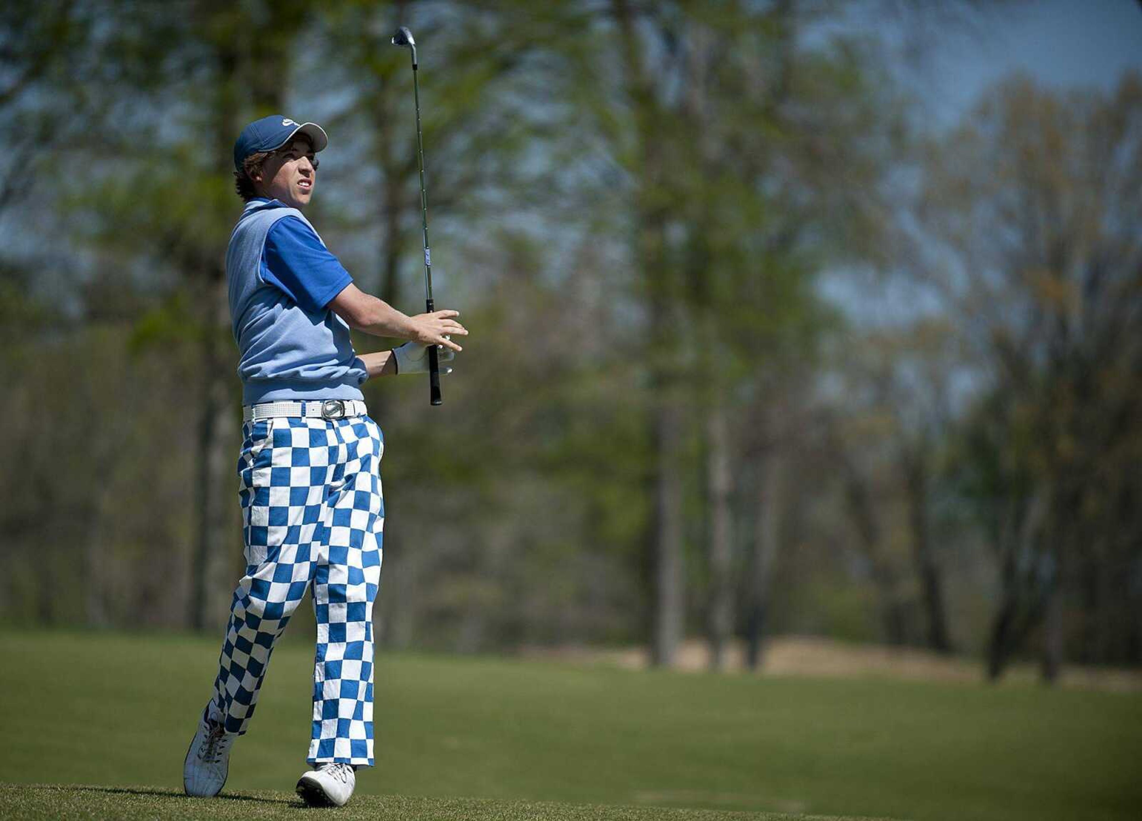 Notre Dame&#8217;s Jack Litzelfelner watches his approach shot on the third hole during the SEMO Conference Golf tournament Tuesday at Dalhousie. Litzelfelner, the defending Class 3 individual state champion, shot a 73 to help the Bulldogs repeat as conference champions.