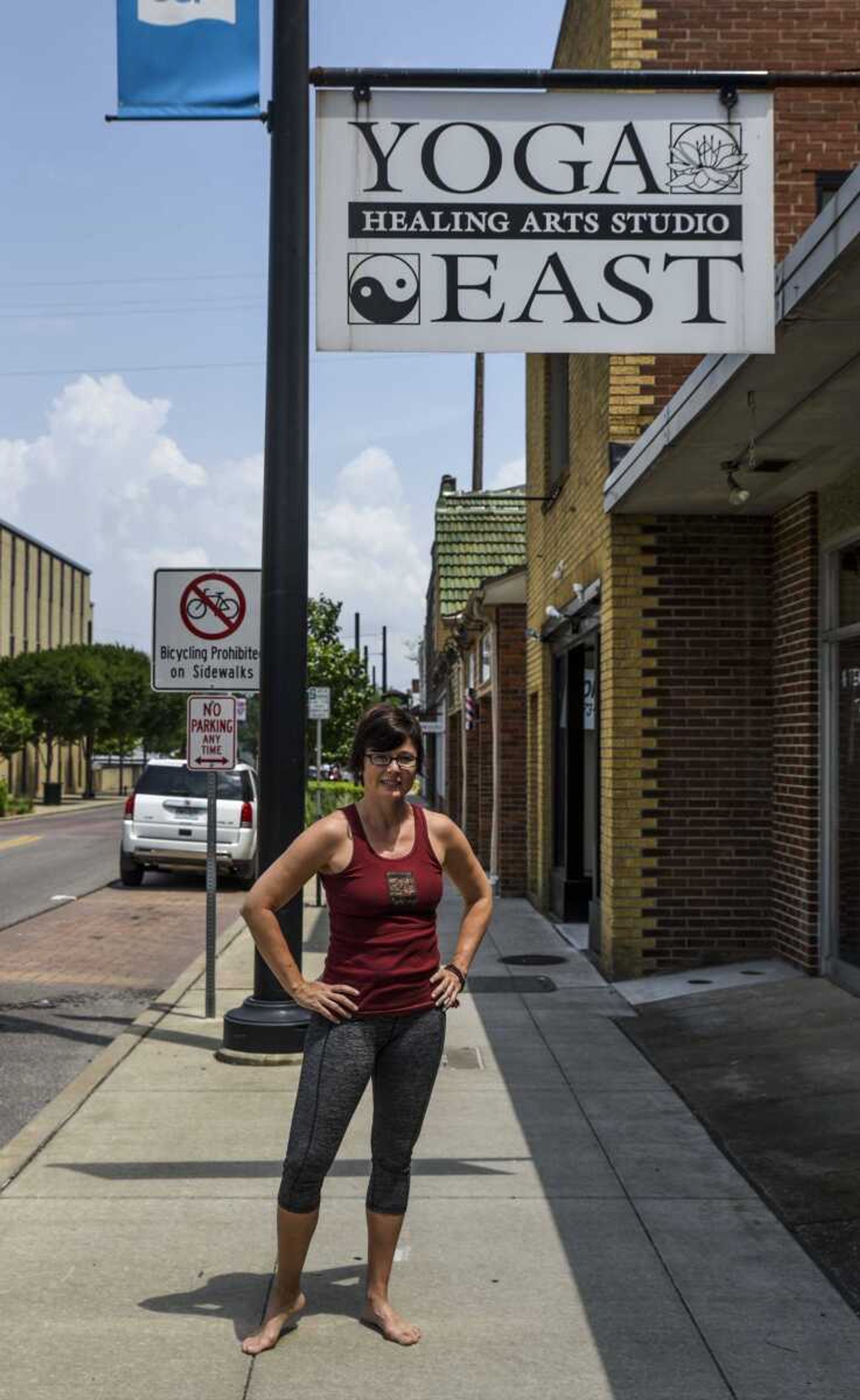 Sue Greenwood poses for a photo July 2 outside of Yoga East in Cape Girardeau.