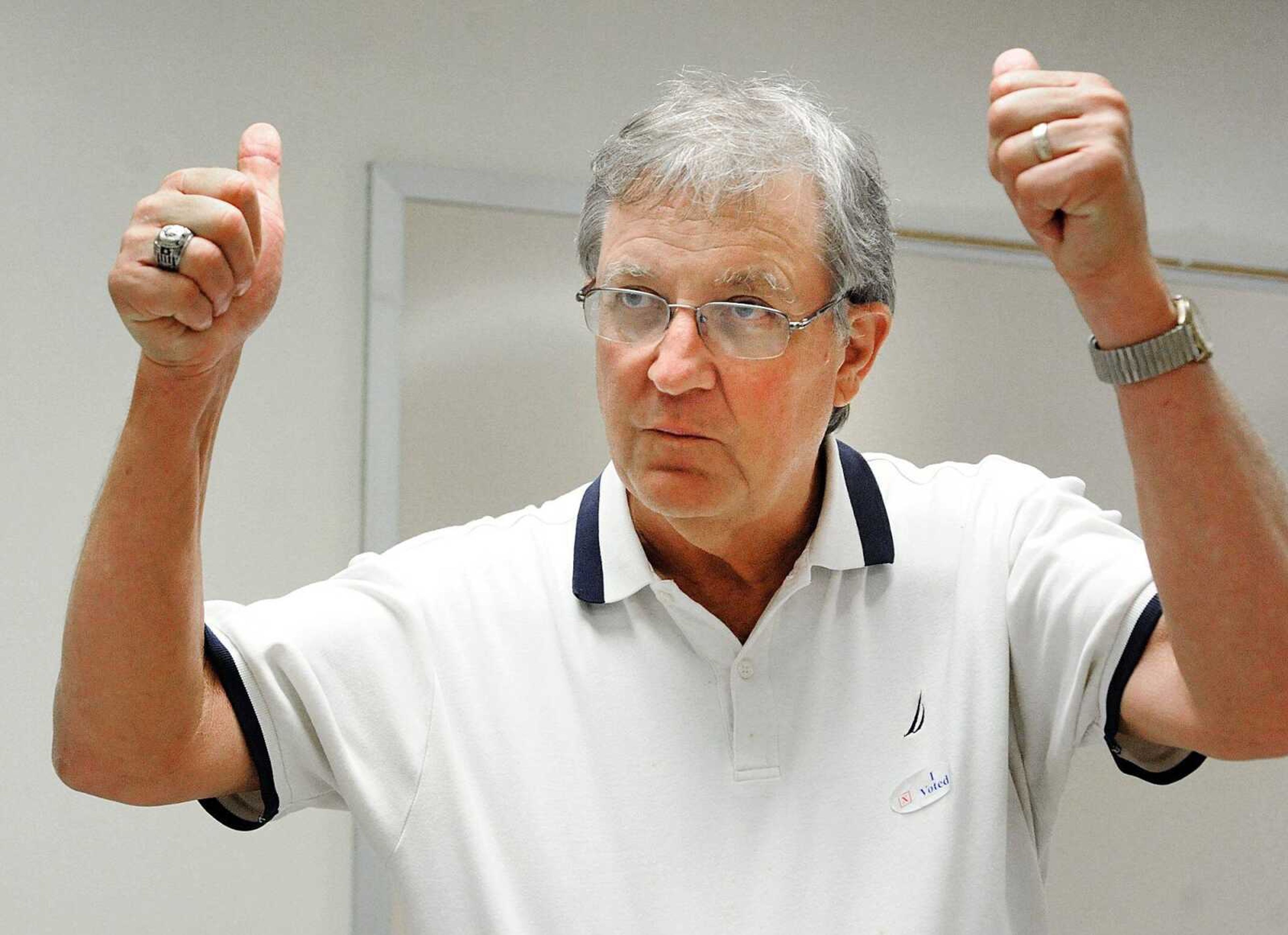 Cape Girardeau County Associate Circuit Judge Division III incumbent Gary Kamp gives two-thumbs up after hearing the final tally in his race against Jeffrey Dix, Tuesday, Aug. 5, 2014 at the Cape Girardeau County Administrative Office Building in Jackson. Kamp defeated Dix. (Laura Simon)