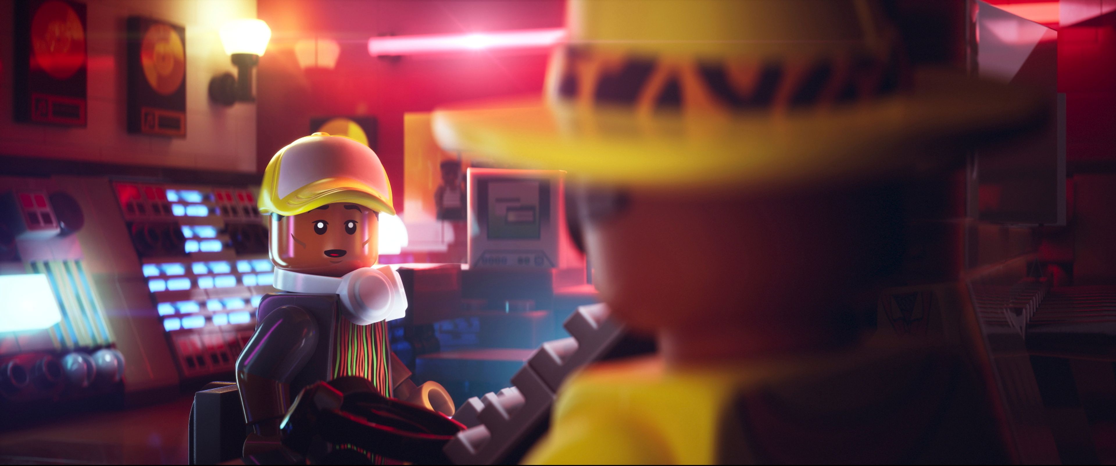 This image released by Focus Features shows lego characters Pharrell Williams, left, in a scene from "Piece By Piece." (Focus Features via AP)