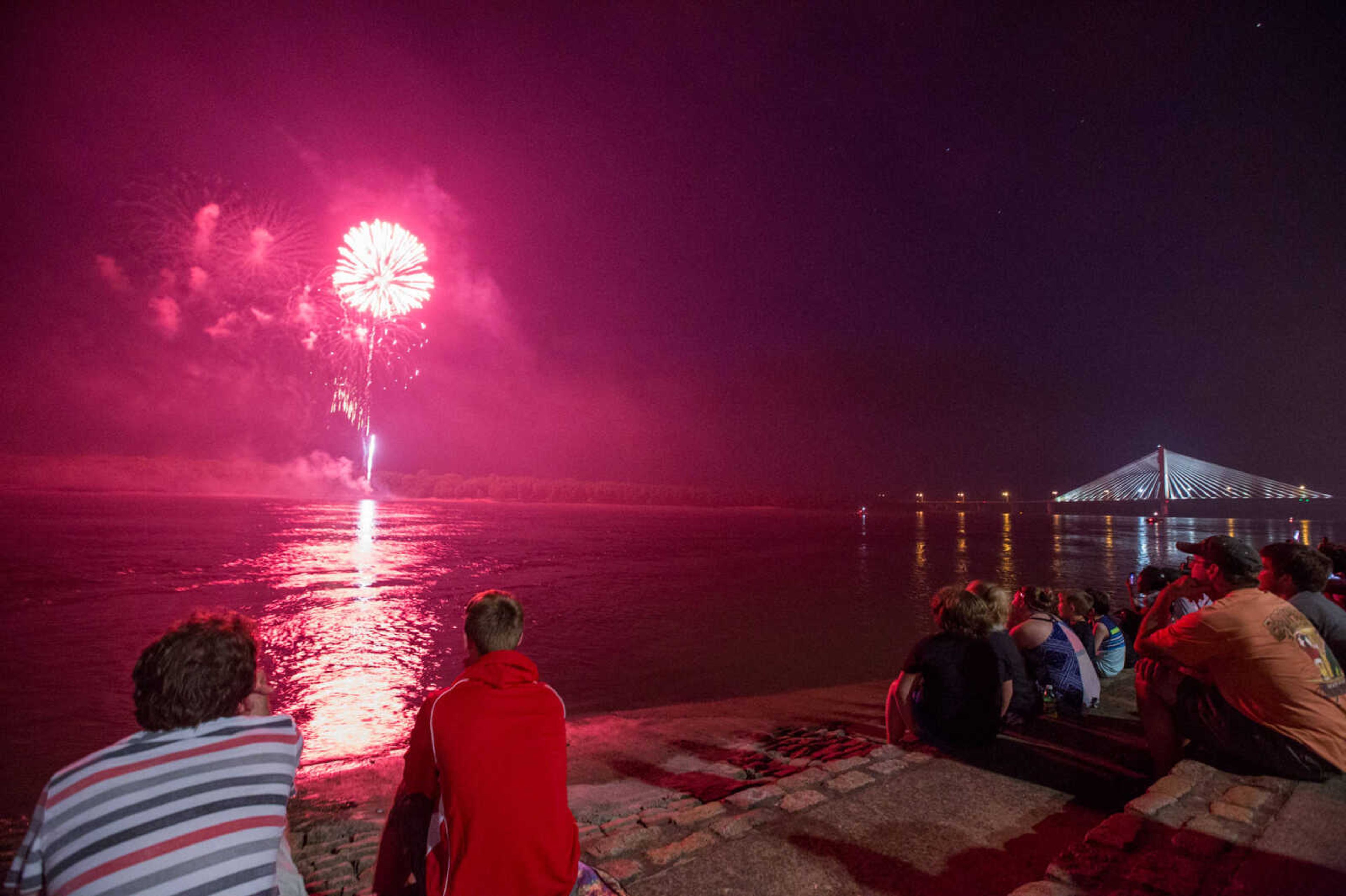 GLENN LANDBERG ~ glandberg@semissourian.com

A crowd takes in the firework display on the riverfront for the Great American Fourth of July celebration in Downtown Cape Girardeau Monday, July 4, 2016.