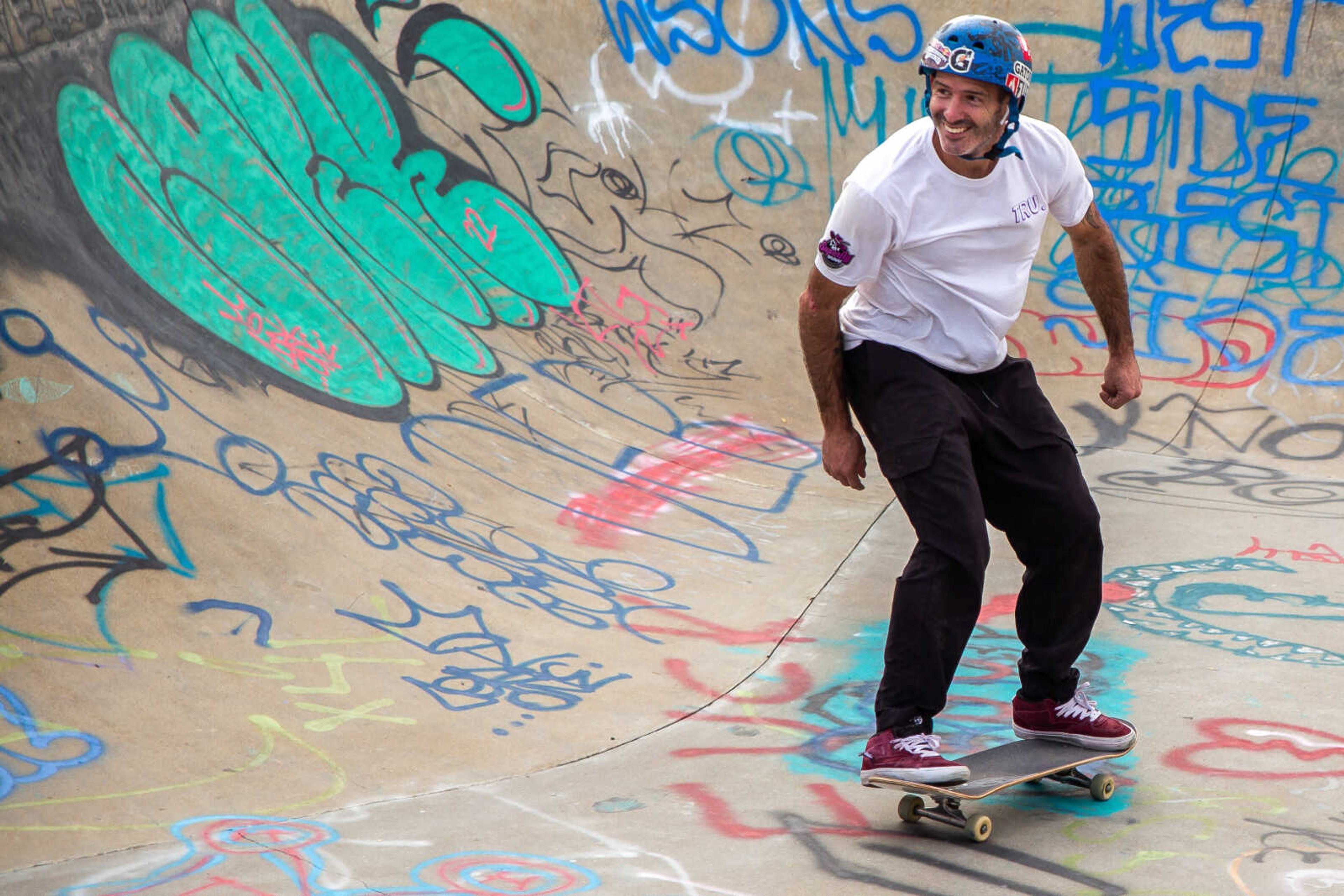 Deano Tull smiles as he rides the bowl.