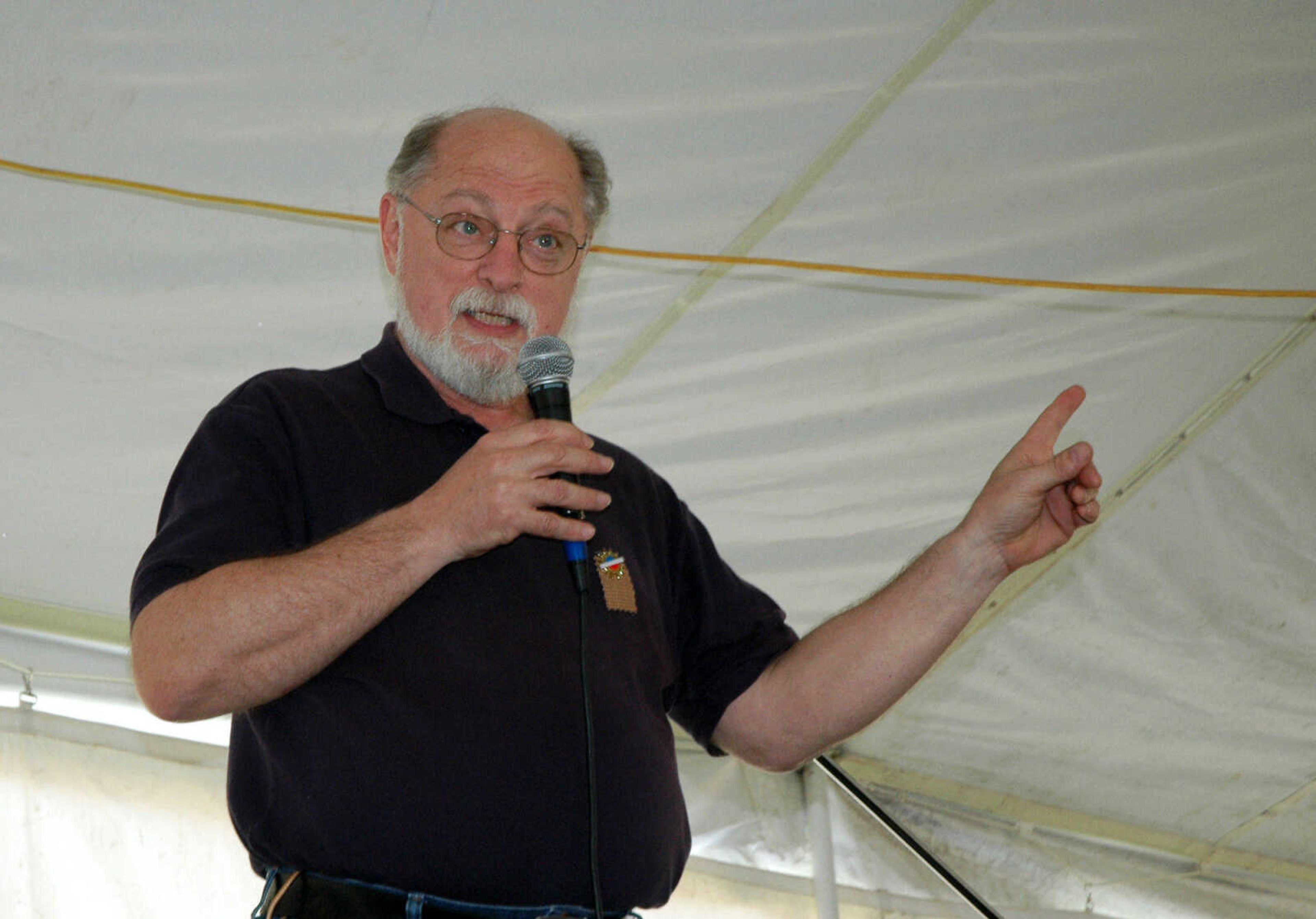 MELISSA MILLER ~ mmiller@semissourian.com

Larry Brown, of St. Louis, takes the stage during "swapping ground" at the Storytelling Festival in Cape Girardeau, Mo., on Saturday, April 10, 2010. The swapping ground portion of the festival allows anyone the chance to take the stage and try their hand at storytelling.