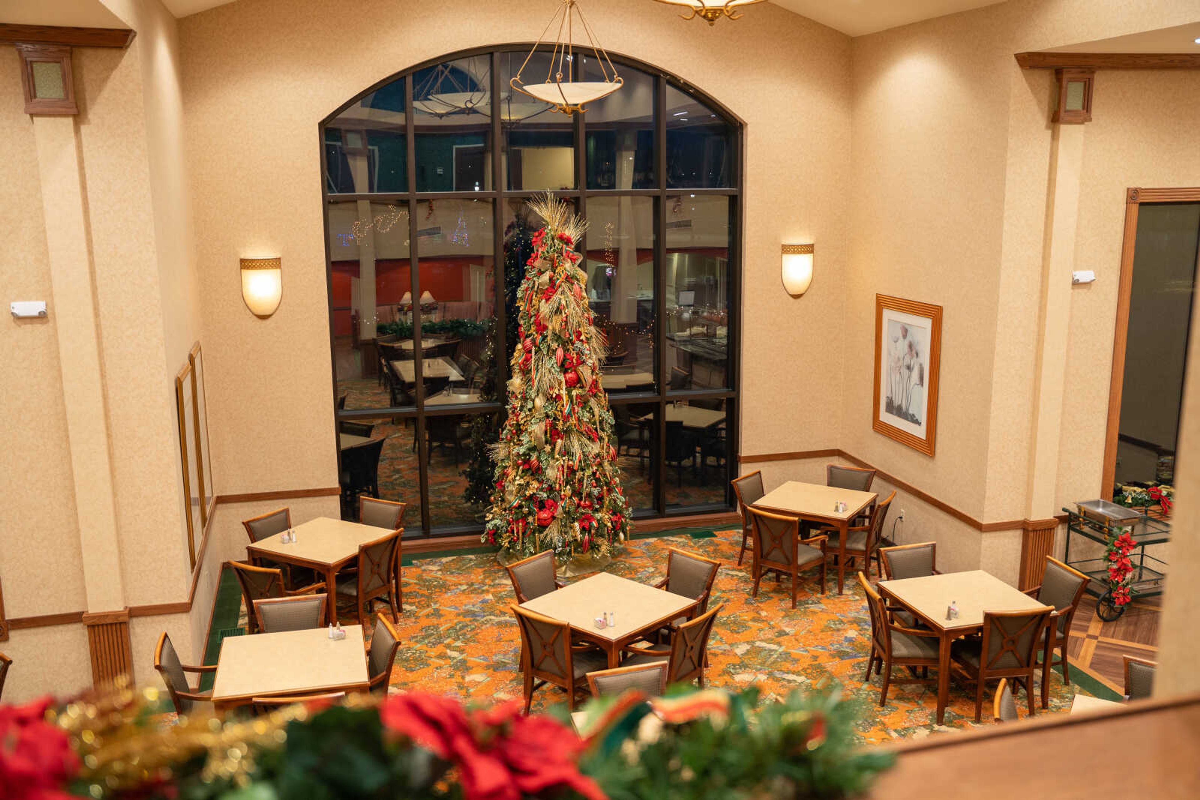 A Christmas tree is decorated at the Lutheran Home in Cape Girardeau. Helping older adults put up and take down Christmas decorations during the holidays can help share the Christmas spirit.