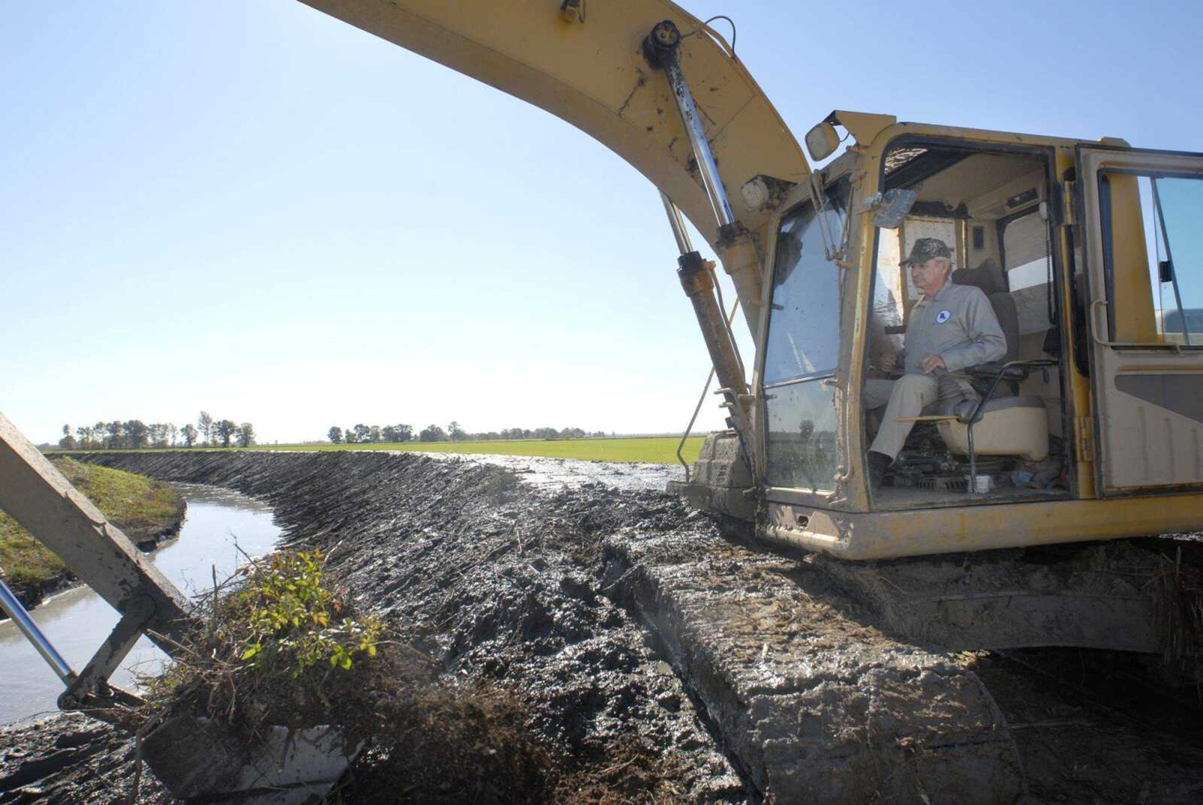 Lawrence Gilliland excavated the channel along ditch No. 34 Friday near Painton, Mo. More than 1,000 miles of ditches make up the Little River Drainage District, which extends from Cape Girardeau to the Arkansas border. (KIT DOYLE~ kdoyle@semissourian.com)