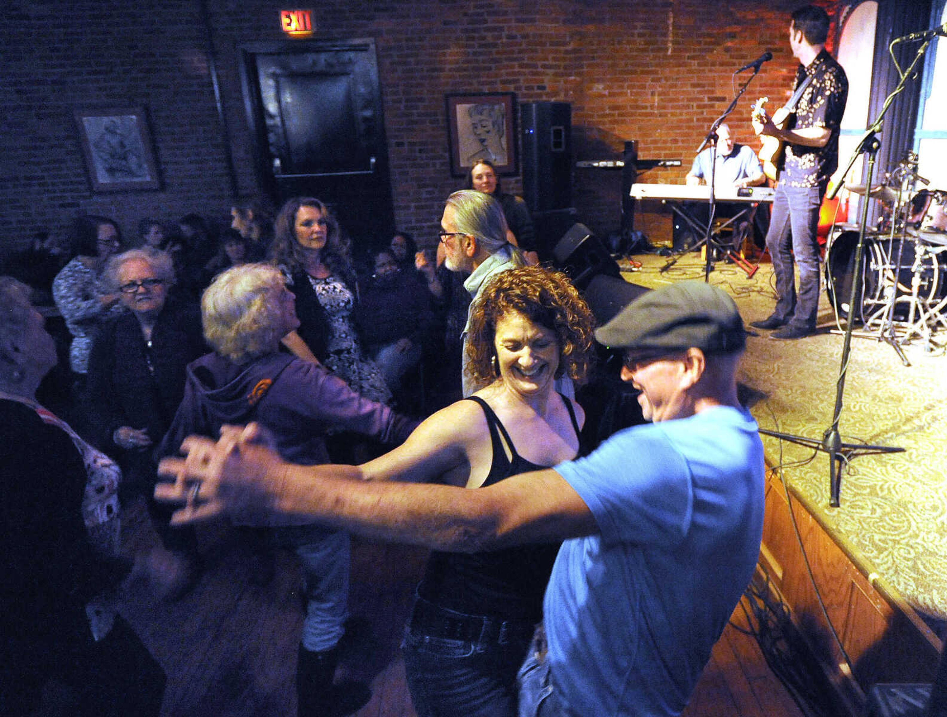 FRED LYNCH ~ flynch@semissourian.com
Danny and Colleen Rees dance together Saturday, March 11, 2017 as the Ivas John Band performs during the sixth annual Cross Rivers Roots & Blues Festival at the River City Yacht Club in downtown Cape Girardeau.