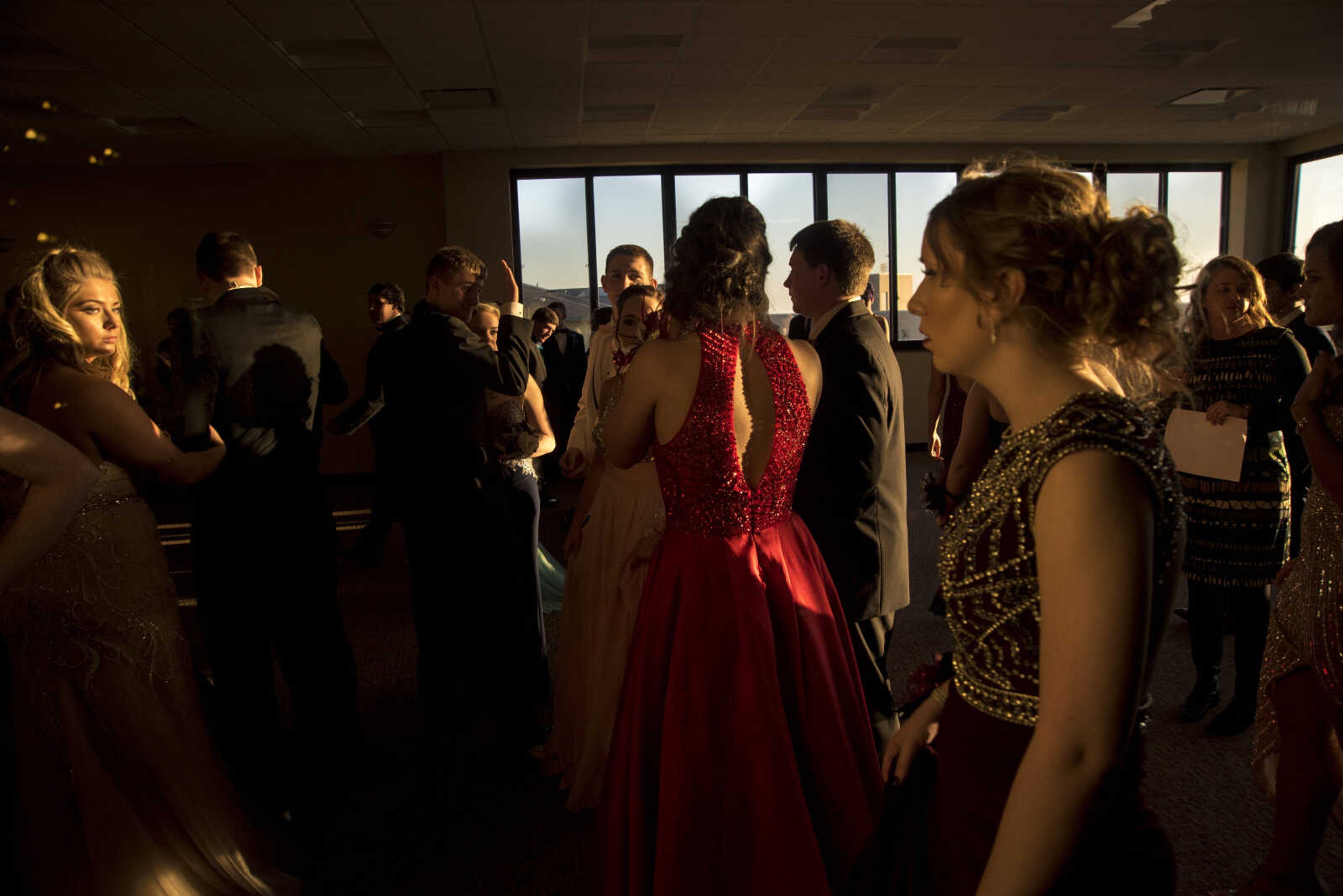 Students wait in line for the grand march during the Chaffee prom Saturday, April 1, 2017 at the University Center on the campus of Southeast Missouri State University in Cape Girardeau.