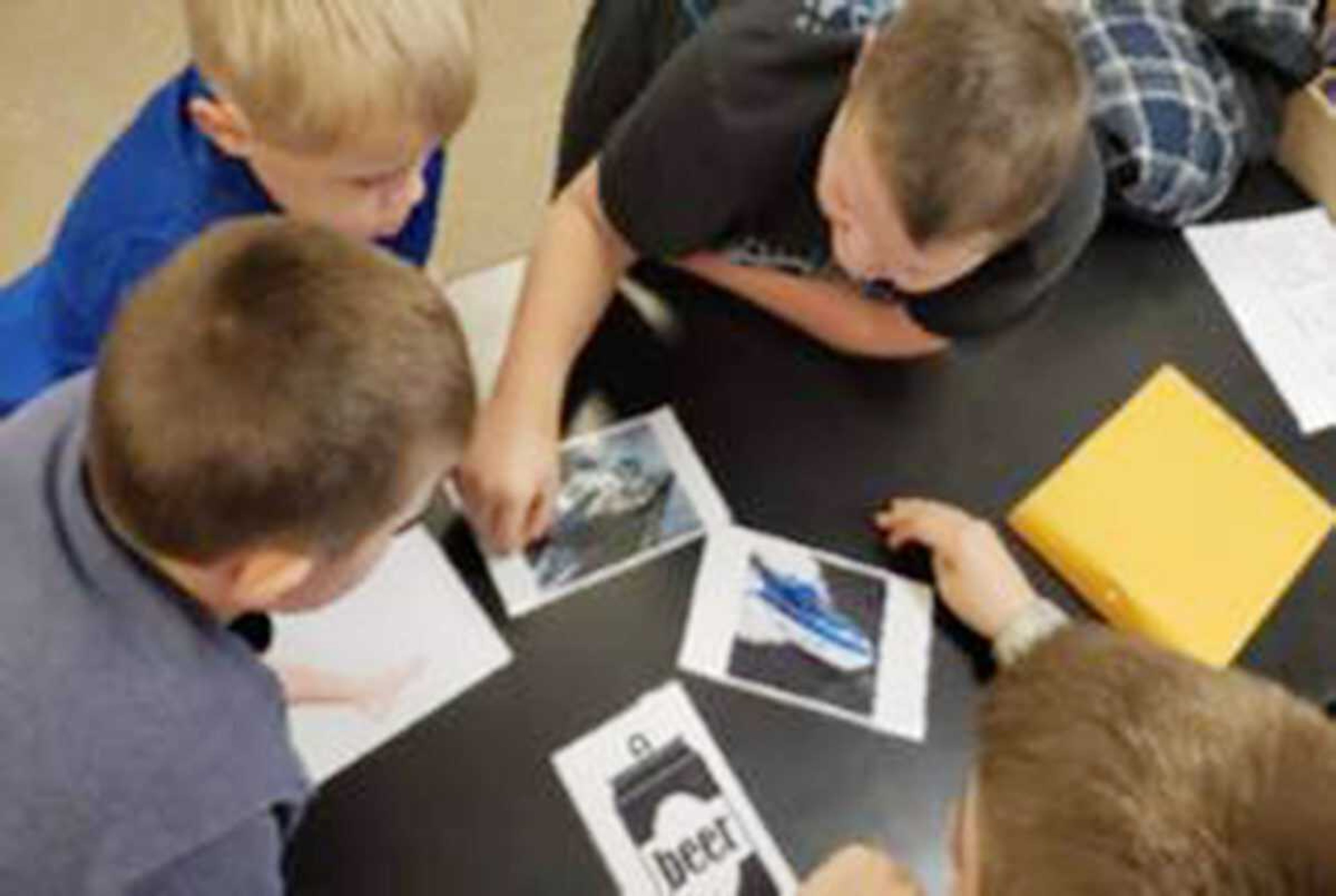 The slogan of 4-H is "Learning to do by doing". That's what 4-H is about, and in this picture youth were doing to learn during one of the presentations.