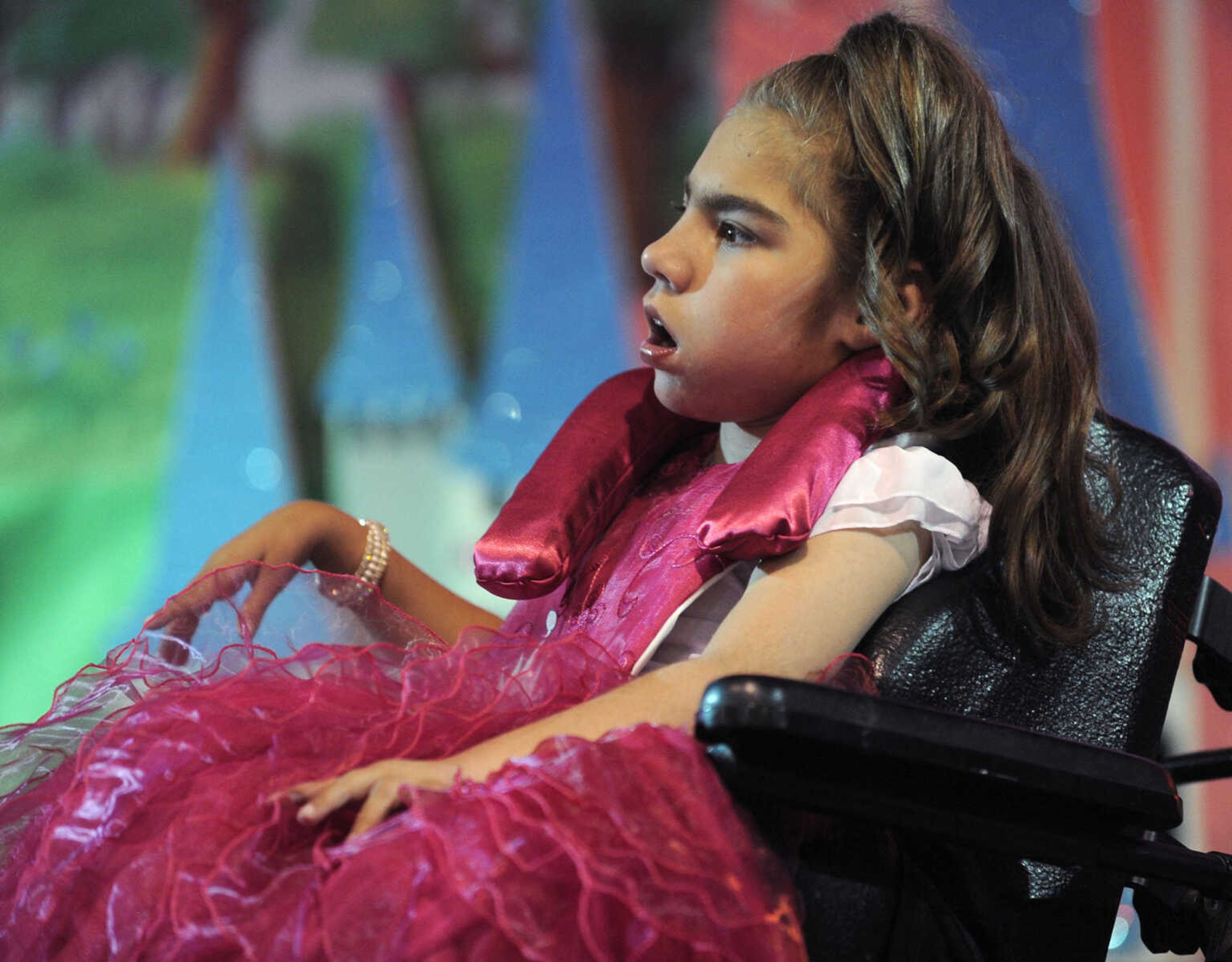 Kailee Kyle poses for the judges in the 5-9 age division of the S. E. Missouri Angels Pageant on Saturday, April 26, 2014 at Scott City High School.