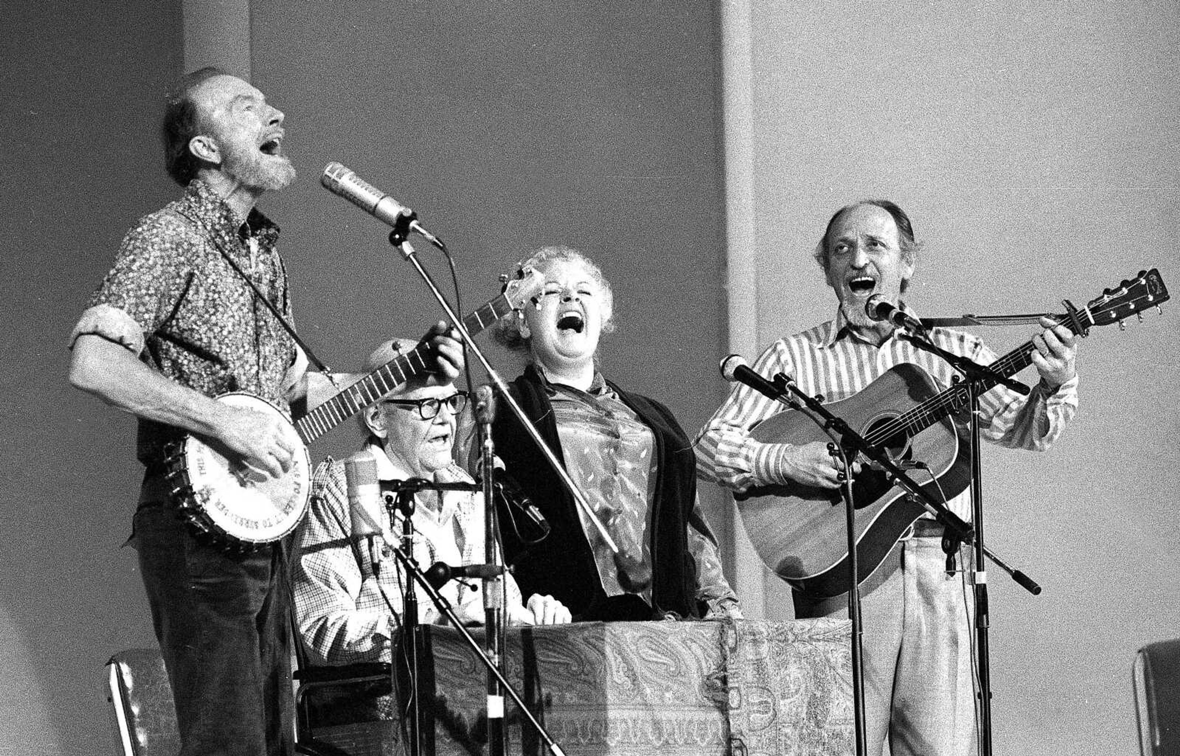 The Weavers perform in a 25th Anniversary reunion concert in 1980 at Carnegie Hall in New York. From left are Pete Seeger, Lee Hays, Ronnie Gilbert and Fred Hellerman. (Richard Drew ~ Associated Press)