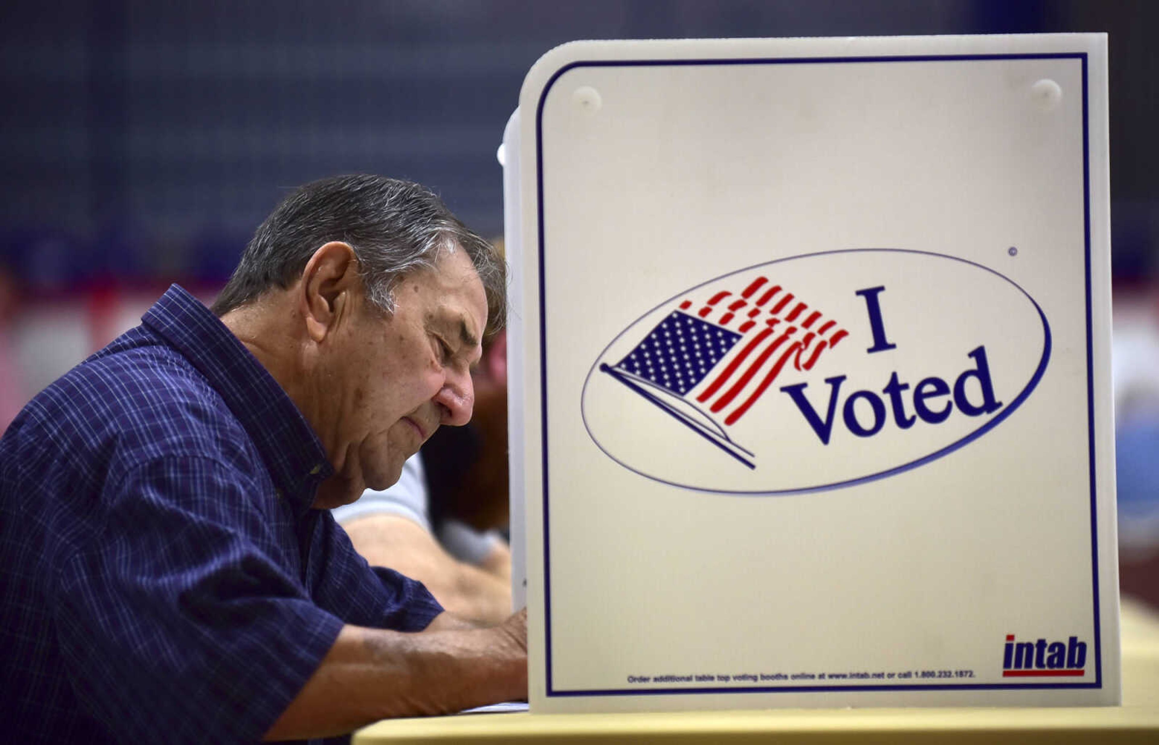 ANDREW J. WHITAKER ~ awhitaker@semissourian.com
Chip Janet sits at a polling booth to casts his ballot at the Arena Building Tuesday, Nov. 8, 2016 in Cape Girardeau.