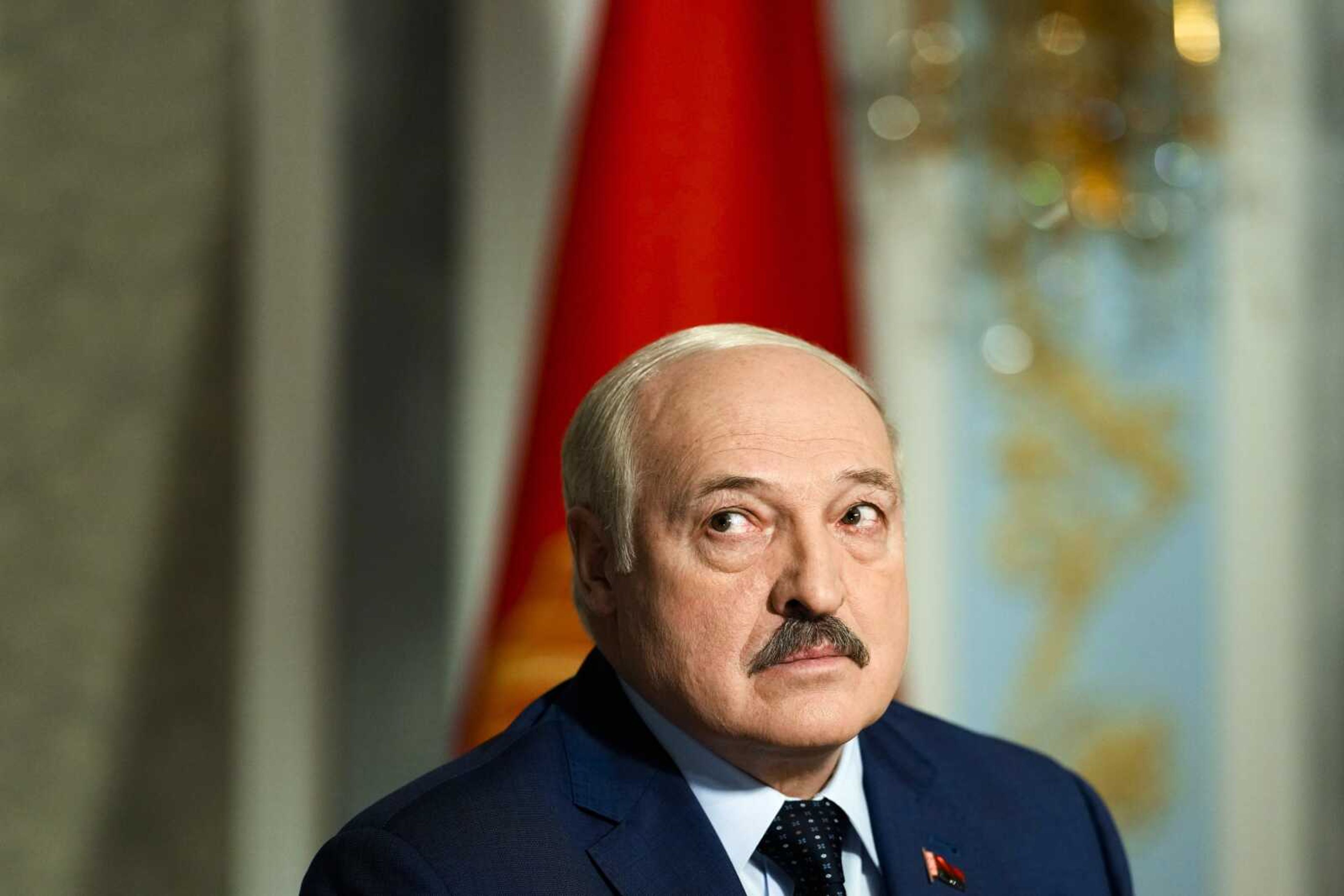 Belarus President Alexander Lukashenko listens to questions during an interview with The Associated Press on Thursday at Independence Palace in Minsk, Belarus.