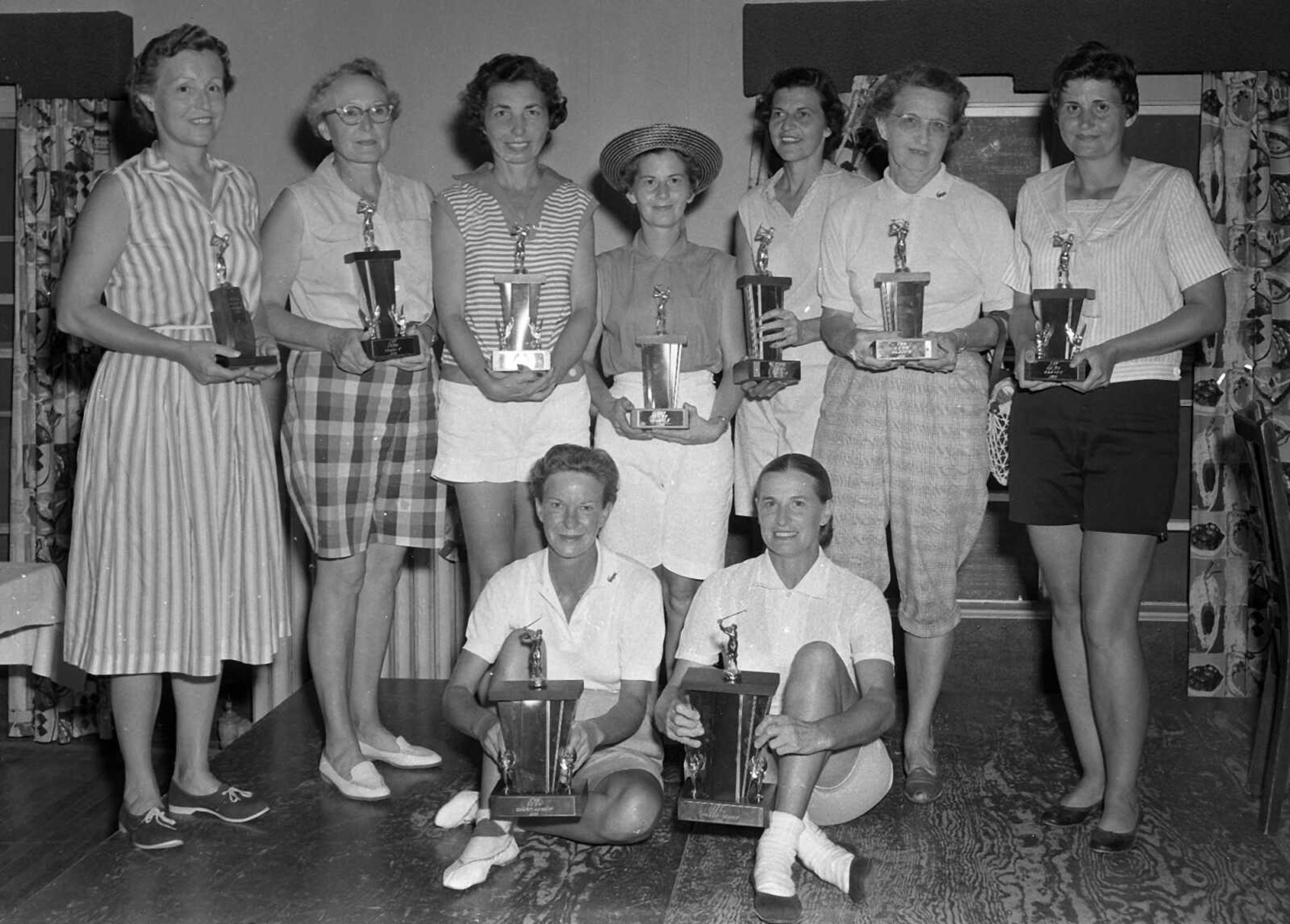 These golfers are all champions, but we don't know who they are. Jerry Frohock wrote: "Golf ladies. Second from left is my aunt Lotus Emerson, Sikeston, Mo. She usually played at the Sikeston Country Club."