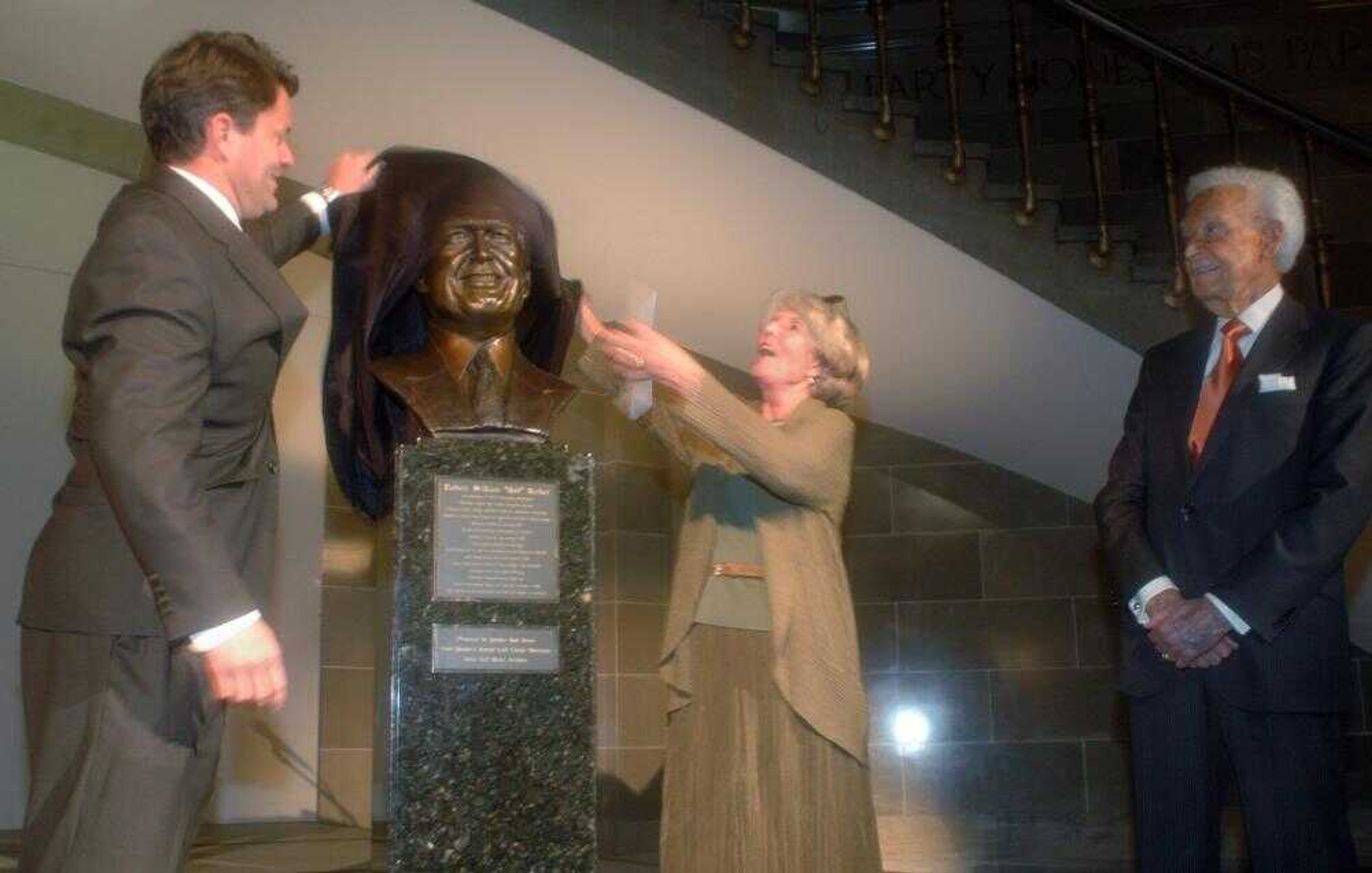 Television personality Bob Barker, right, watched Missouri House Speaker Rod Jetton, R-Marble Hill, left, and sculptor Sabra Tull-Meyer unveil a bronze bust commemorating his induction into the Hall of Famous Missourians on Wednesday at the Missouri State Capitol in Jefferson City, Mo. Barker grew up in Springfield and graduated from Drury University. (KELLEY McCALL ~ Associated Press)