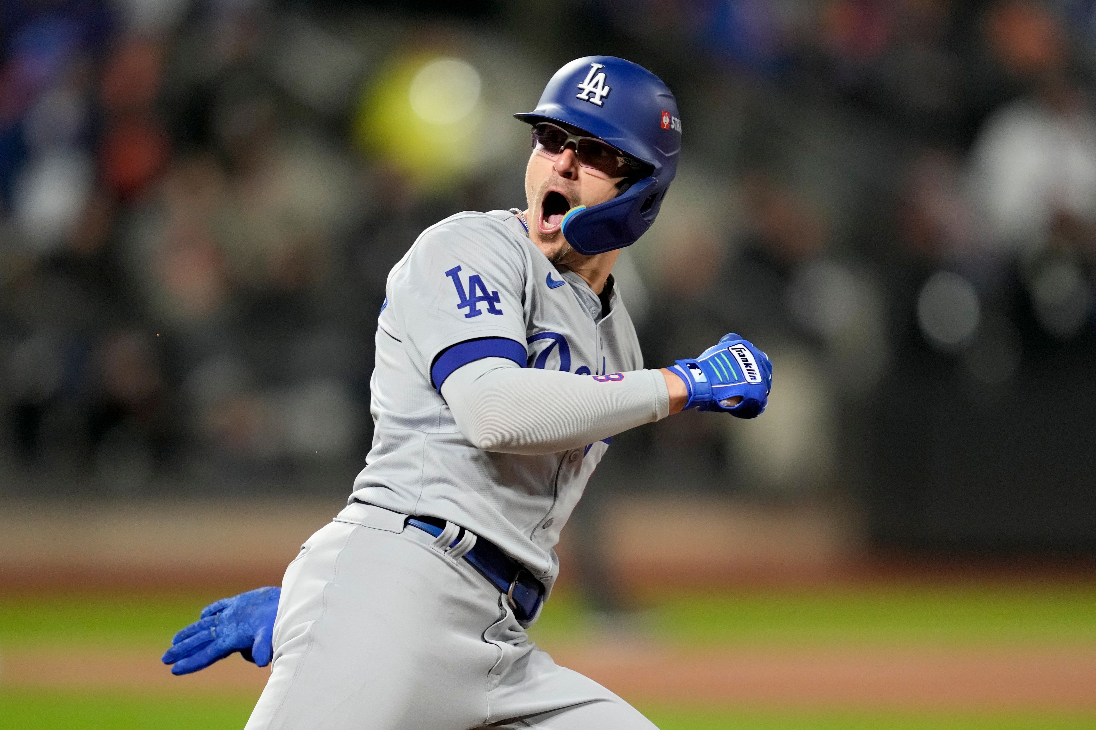 Los Angeles Dodgers' Enrique Hernández celebrates his two-run home run against the New York Mets during the sixth inning in Game 3 of a baseball NL Championship Series, Wednesday, Oct. 16, 2024, in New York. (AP Photo/Ashley Landis)