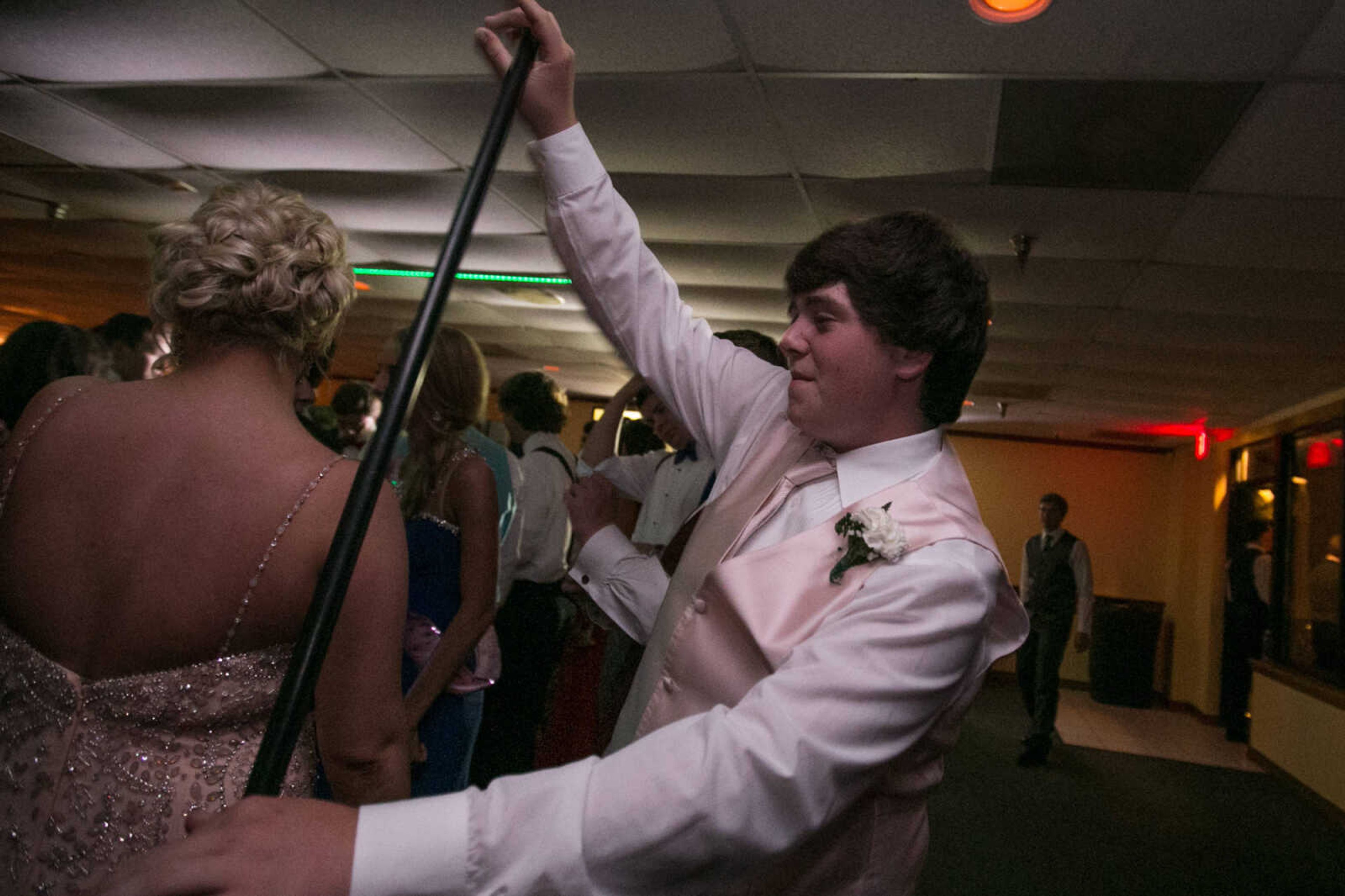 GLENN LANDBERG ~ glandberg@semissourian.com

Students take to the dance floor during the Saxony Lutheran High School's "Classique Magnifique" prom, Saturday, April 23, 2016, at the Cape Girardeau Elks Lodge.