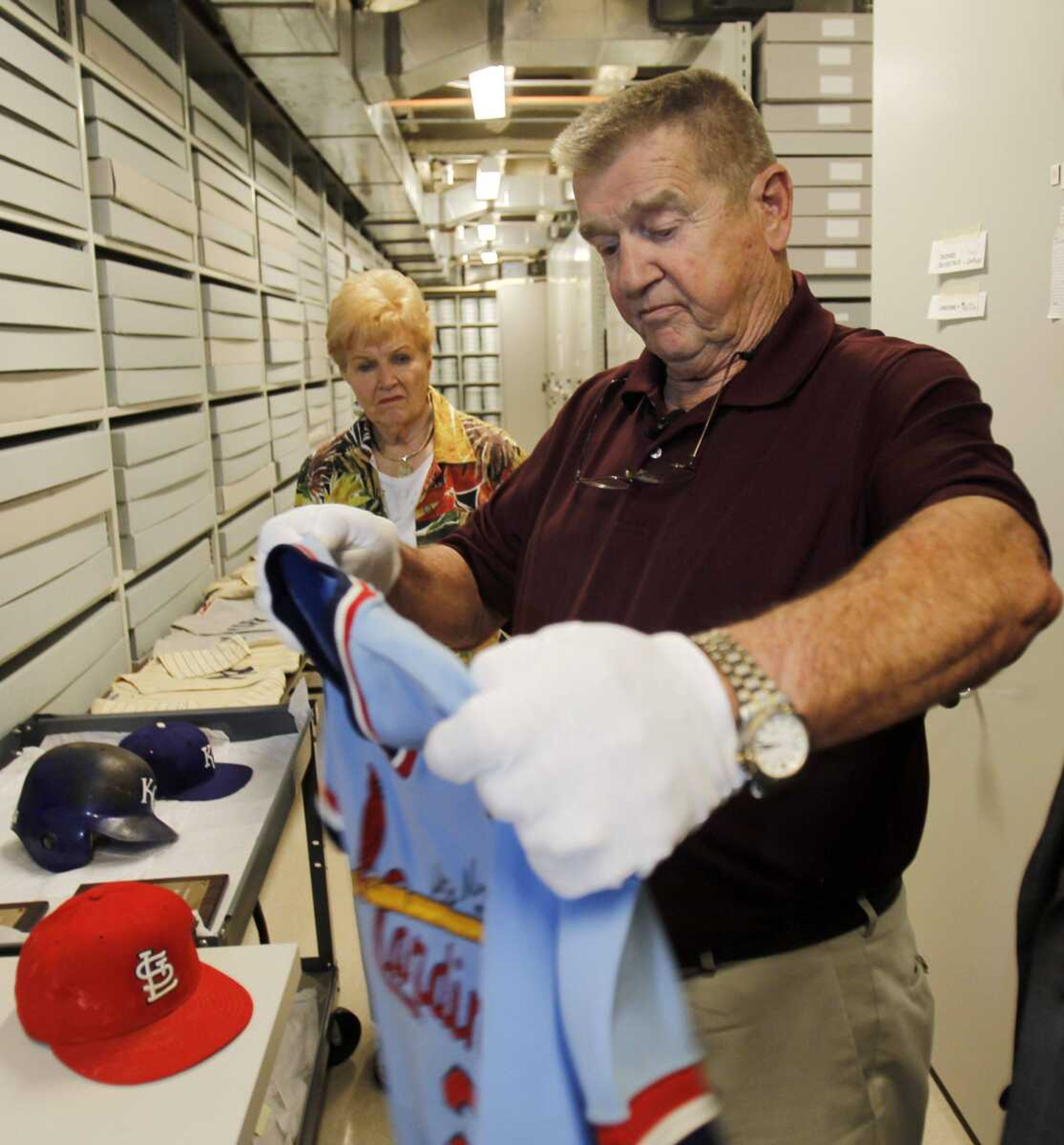 Whitey Herzog looks at his jersey Monday during an orientation visit at the Baseball Hall of Fame in Cooperstown, N.Y. (MIKE GROLL ~ Associated Press)