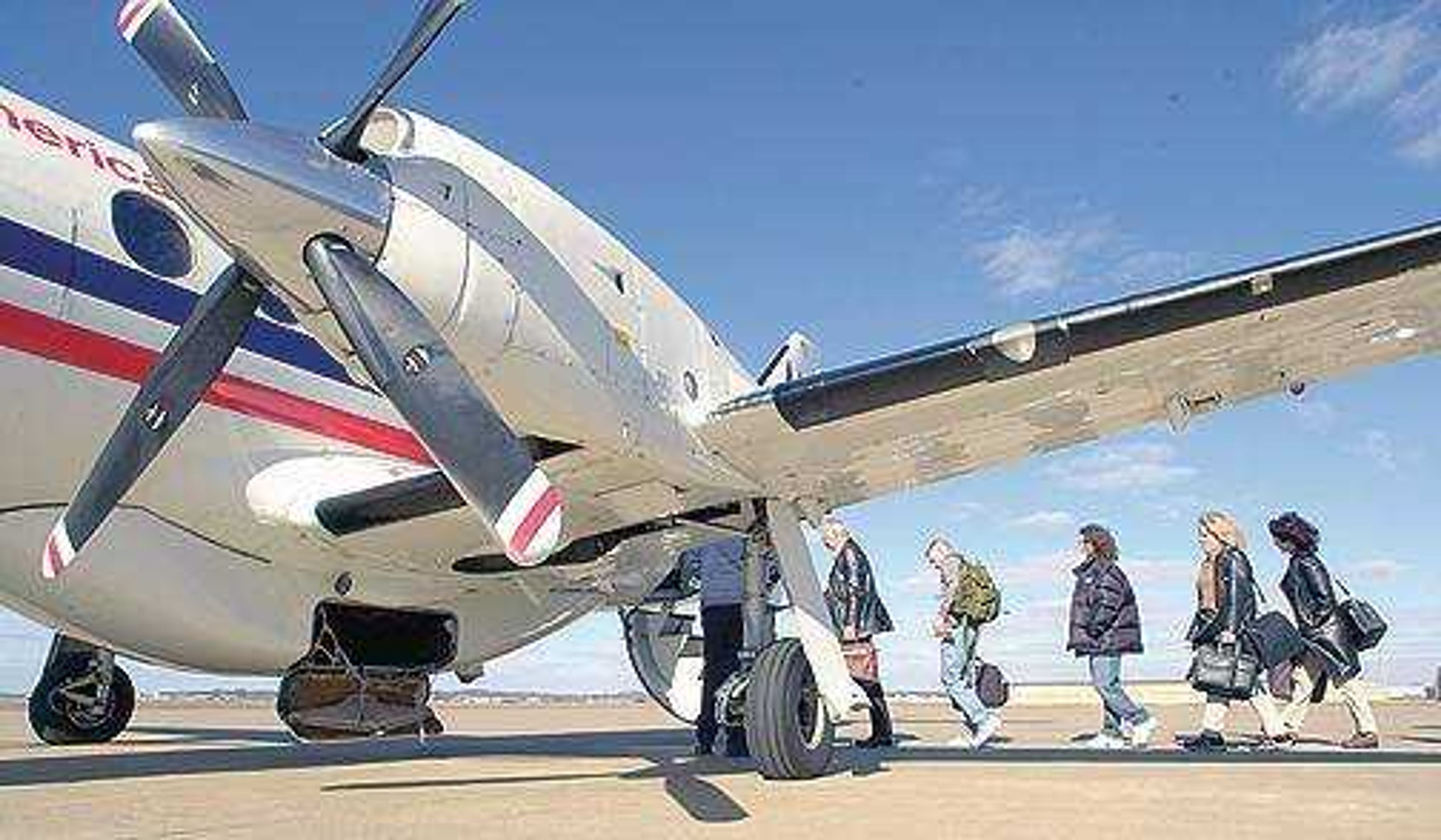 Southeast Missourian/Fred Lynch
Passengers boarded the American Connection flight to St. Louis at the Cape Girardeau Regional Airport Friday morning. If enplanements increase to 10,000 this year, the airport will receive $1 million in federal funding.