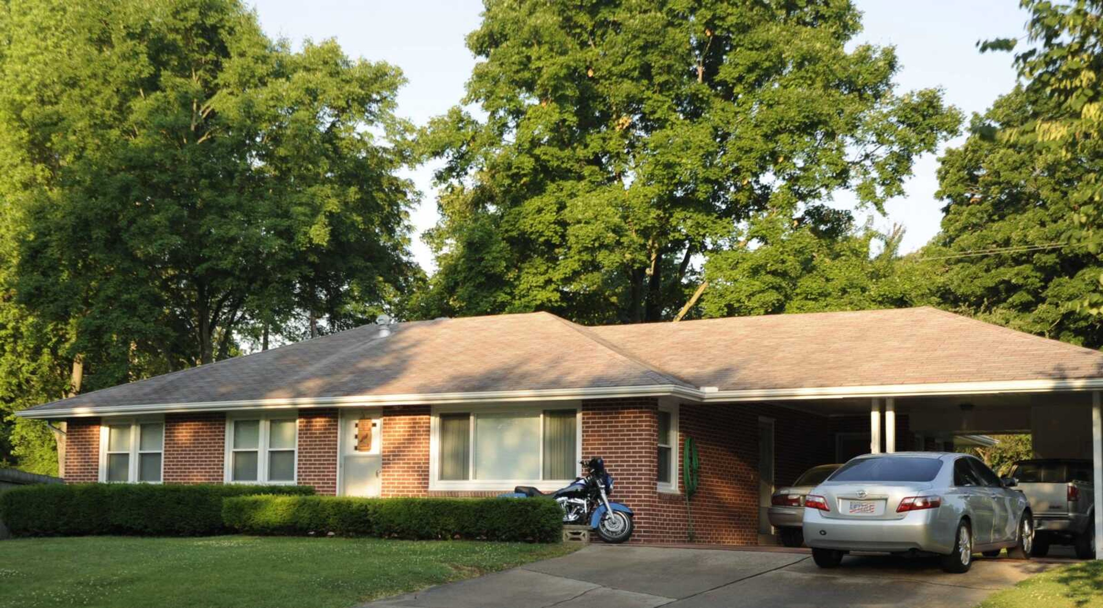 An early morning altercation left two men dead Friday, May 18, at this Cape Girardeau home. The Cape Girardeau Police Department responded to 1129 Landgraf Drive shortly after 3 a.m. and found two men lying in the driveway of the home, both dead from gunshot wounds. Police believe the men's deaths were the result of a murder-suicide according to Lt. John Davis of the Cape Girardeau Police Department. (Adam Vogler)