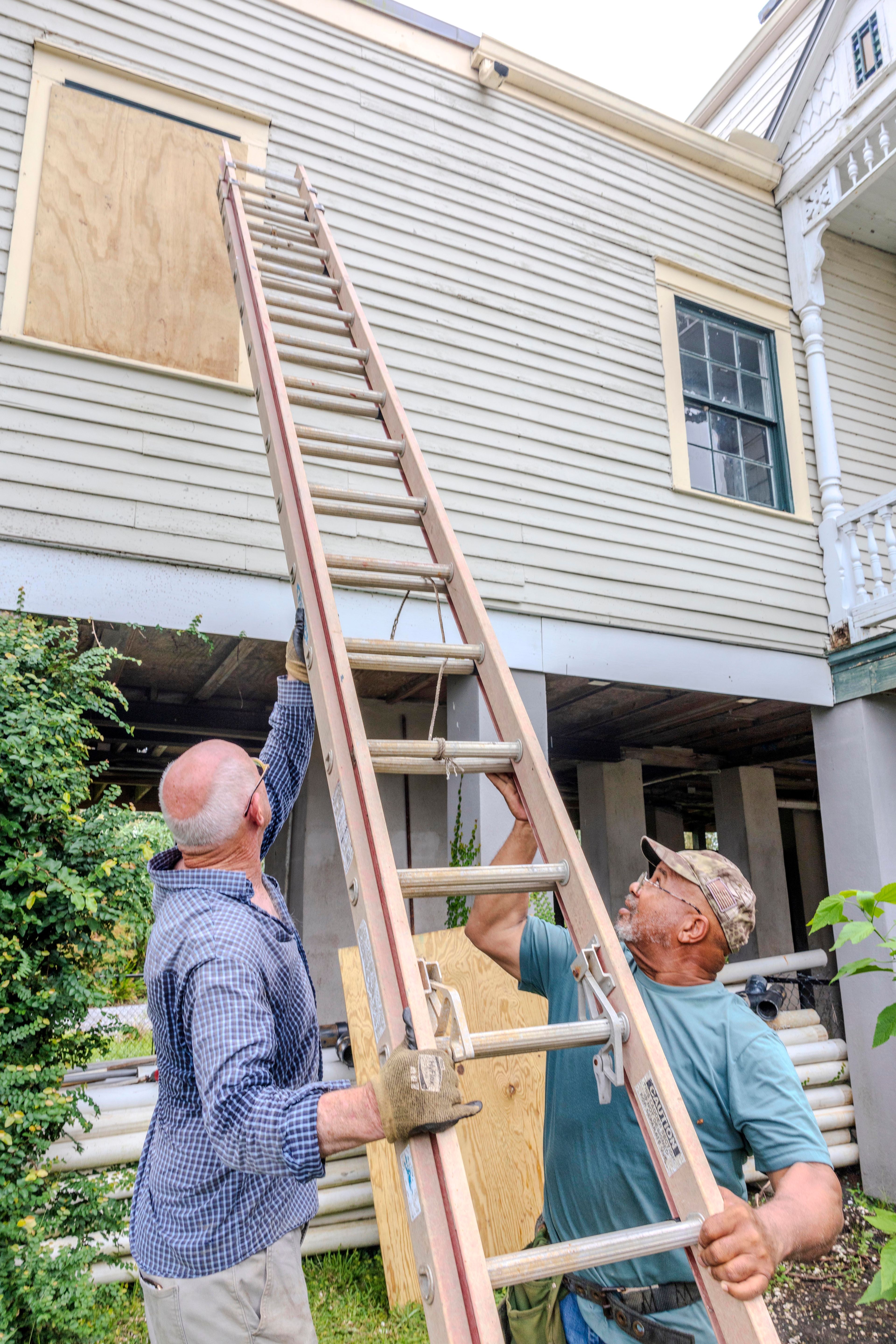 The windows of a raised historic house are boarded up as residents prepare for the arrival of Hurricane Francine along the Louisiana coast on Monday, Sept. 9, 2024, in Lafitte, La. (Chris Granger/The Times-Picayune/The New Orleans Advocate via AP)