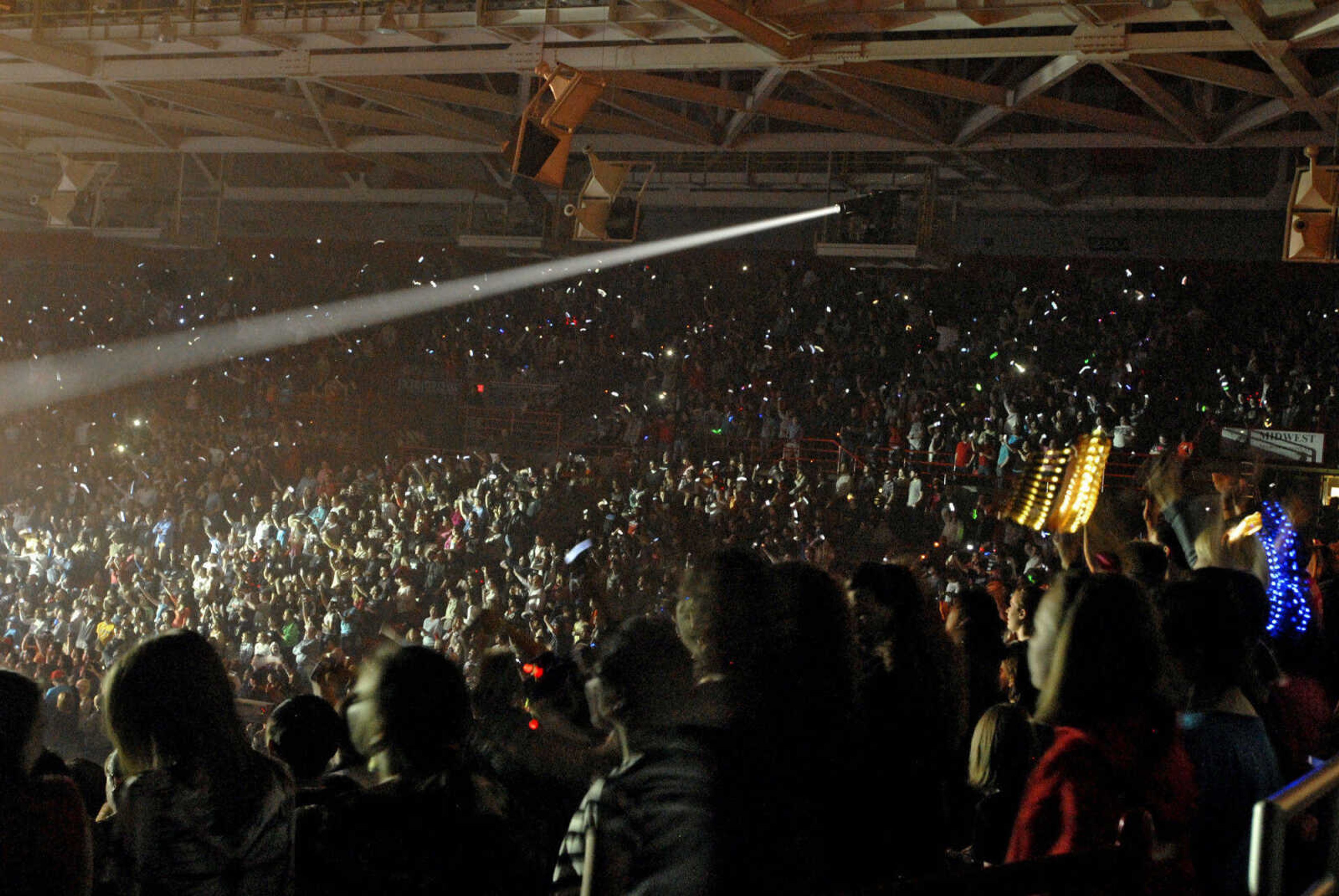 LAURA SIMON~lsimon@semissourian.com
Fans in the Show Me Center wave the lit cell phones in the air as The Afters perform Friday, January 28, 2011 during the Rock and Worship Roadshow 2011 tour at the Show Me Center in Cape Girardeau.