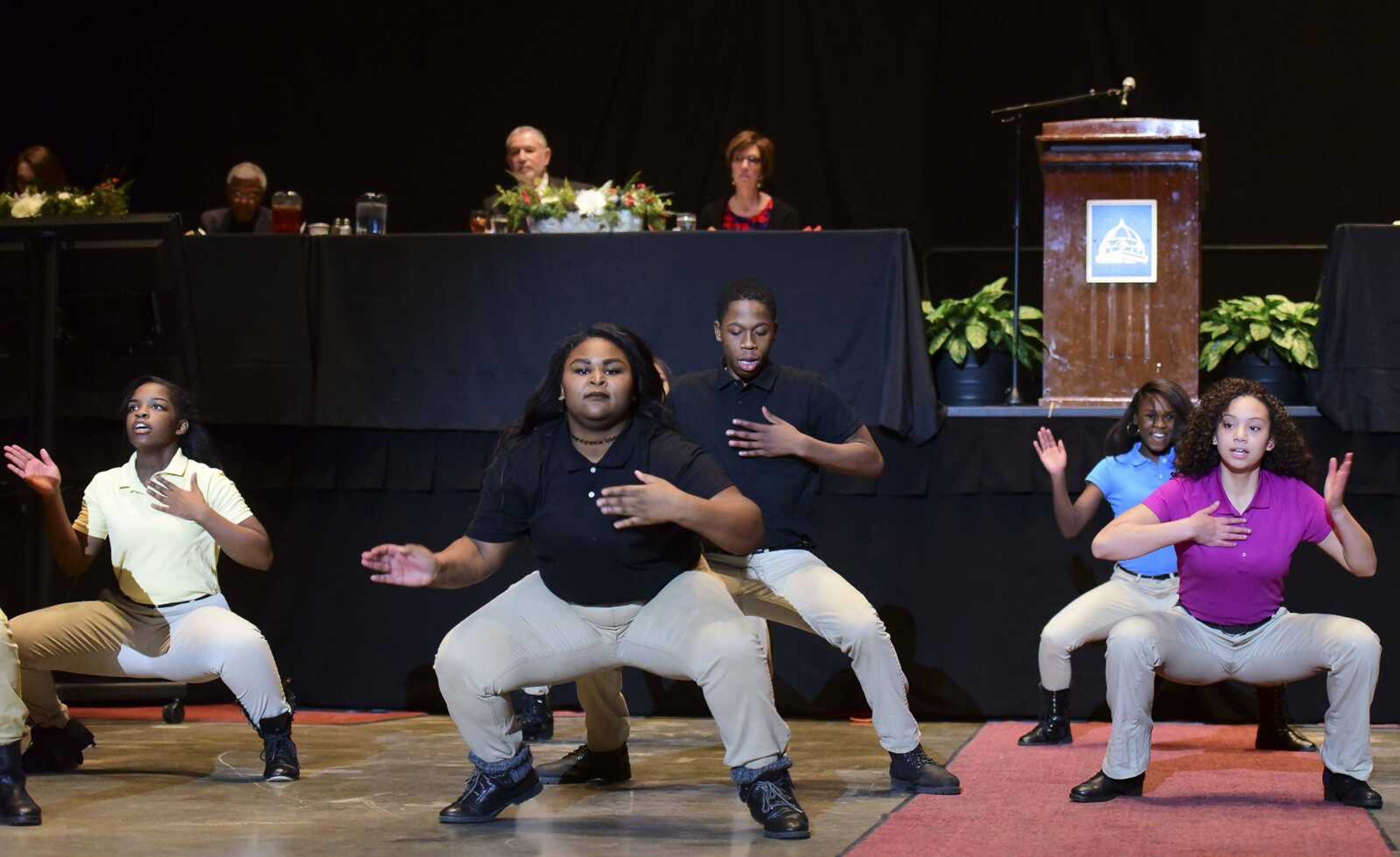 STEP UP Leadership Academy performs during the Dr. Martin Luther King Jr. Celebration Dinner on Wednesday at the Show Me Center in Cape Girardeau.