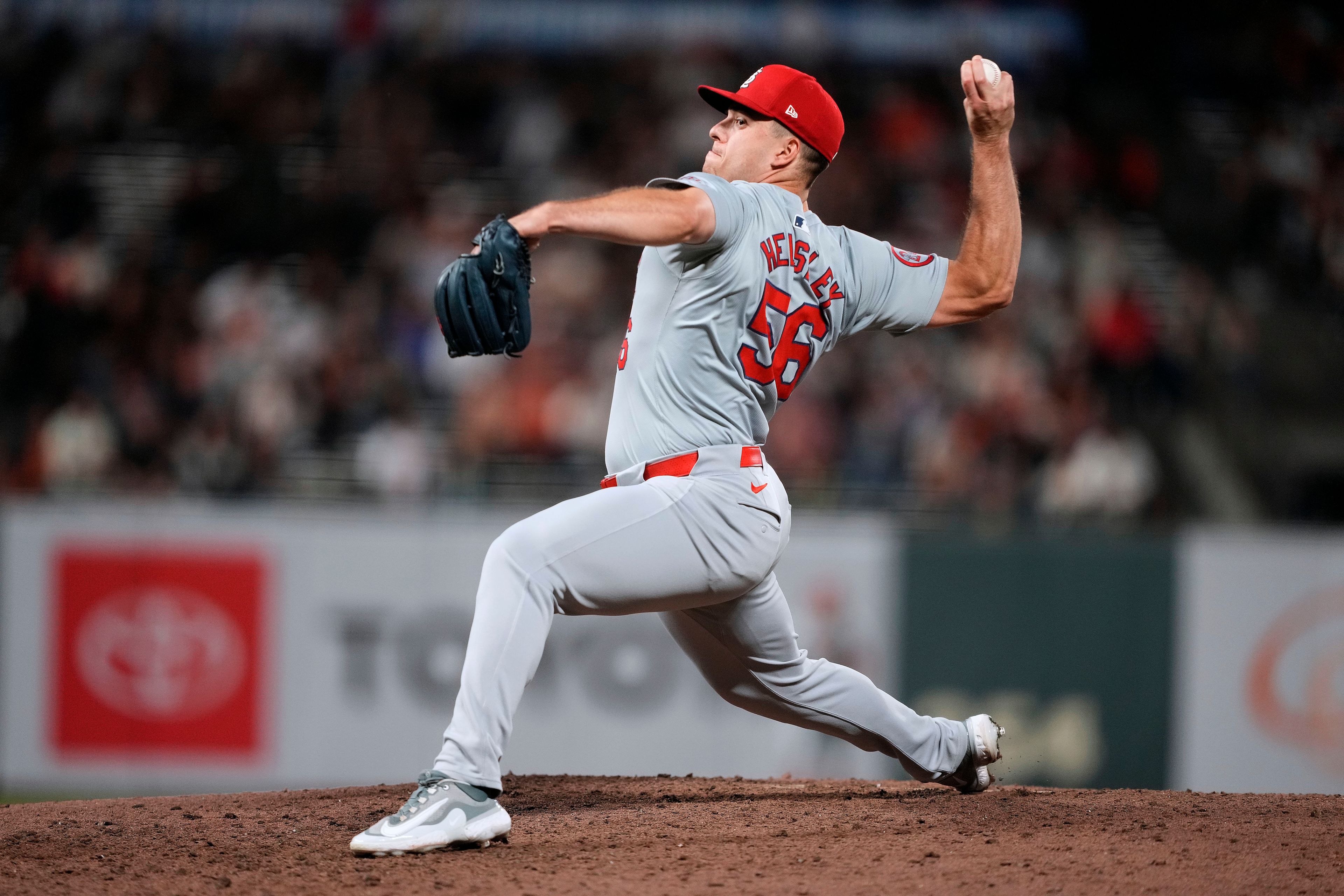 St. Louis Cardinals pitcher Ryan Helsley (56) throws against the San Francisco Giants during the ninth inning of a baseball game Friday, Sept. 27, 2024, in San Francisco. (AP Photo/Tony Avelar)