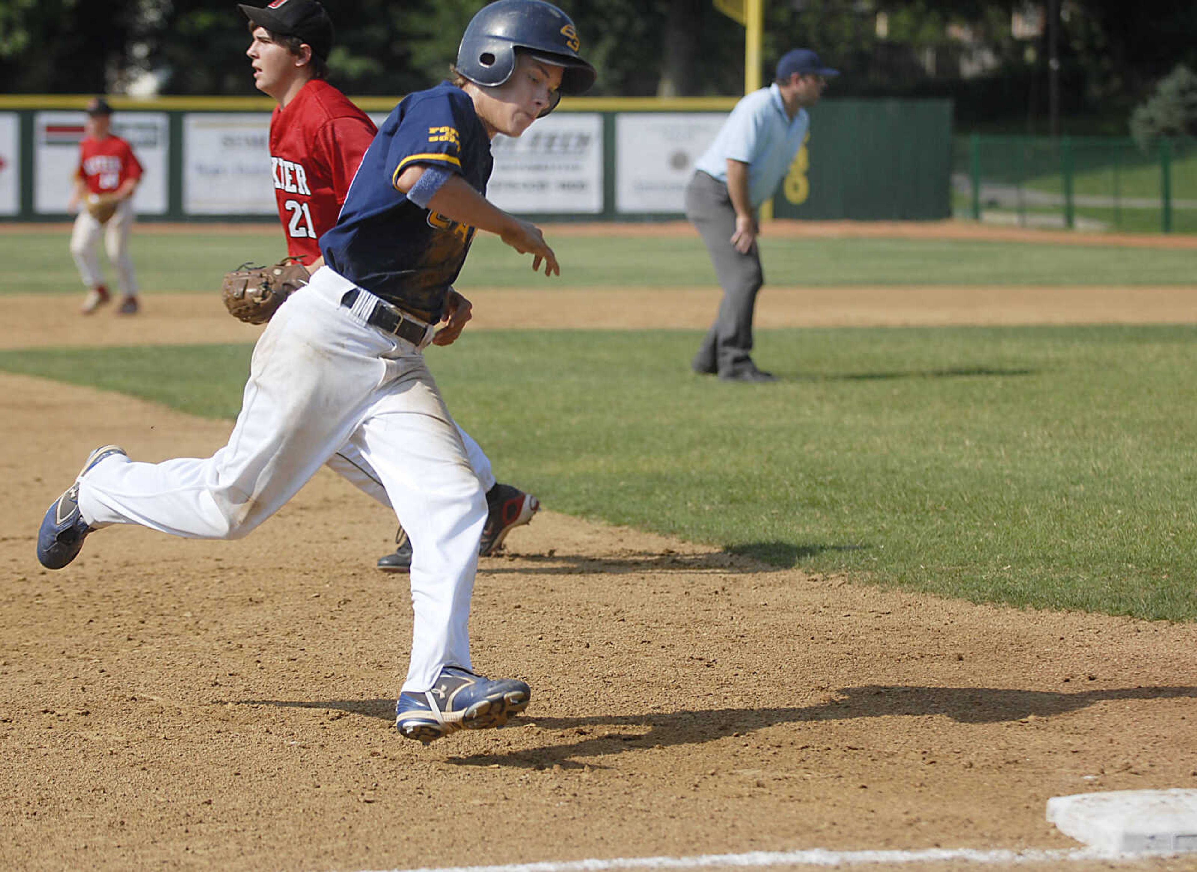 KIT DOYLE ~ kdoyle@semissourian.com
Cape Legion runner Skylar Cobb rounds third base while scoring Monday, July 13, 2009, at Capaha Field.