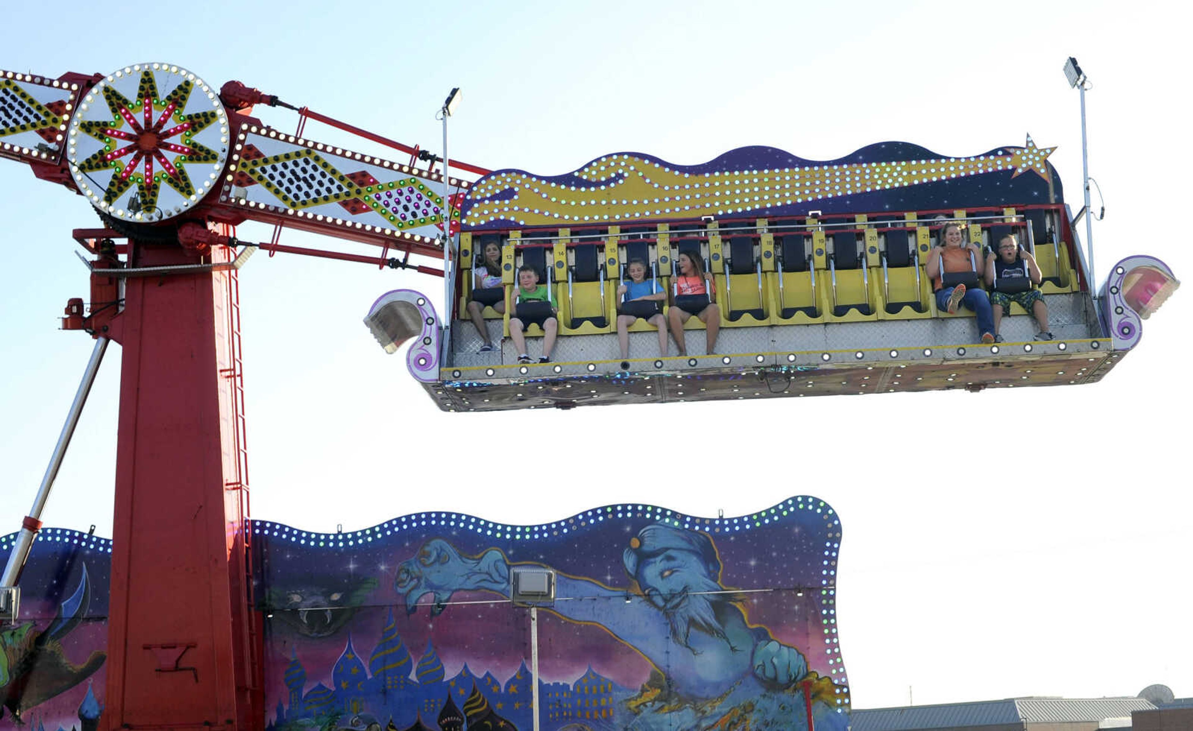 FRED LYNCH ~ flynch@semissourian.com
People take a spin on the Ali Baba ride Tuesday, July 24, 2018 at Homecomers in Jackson.