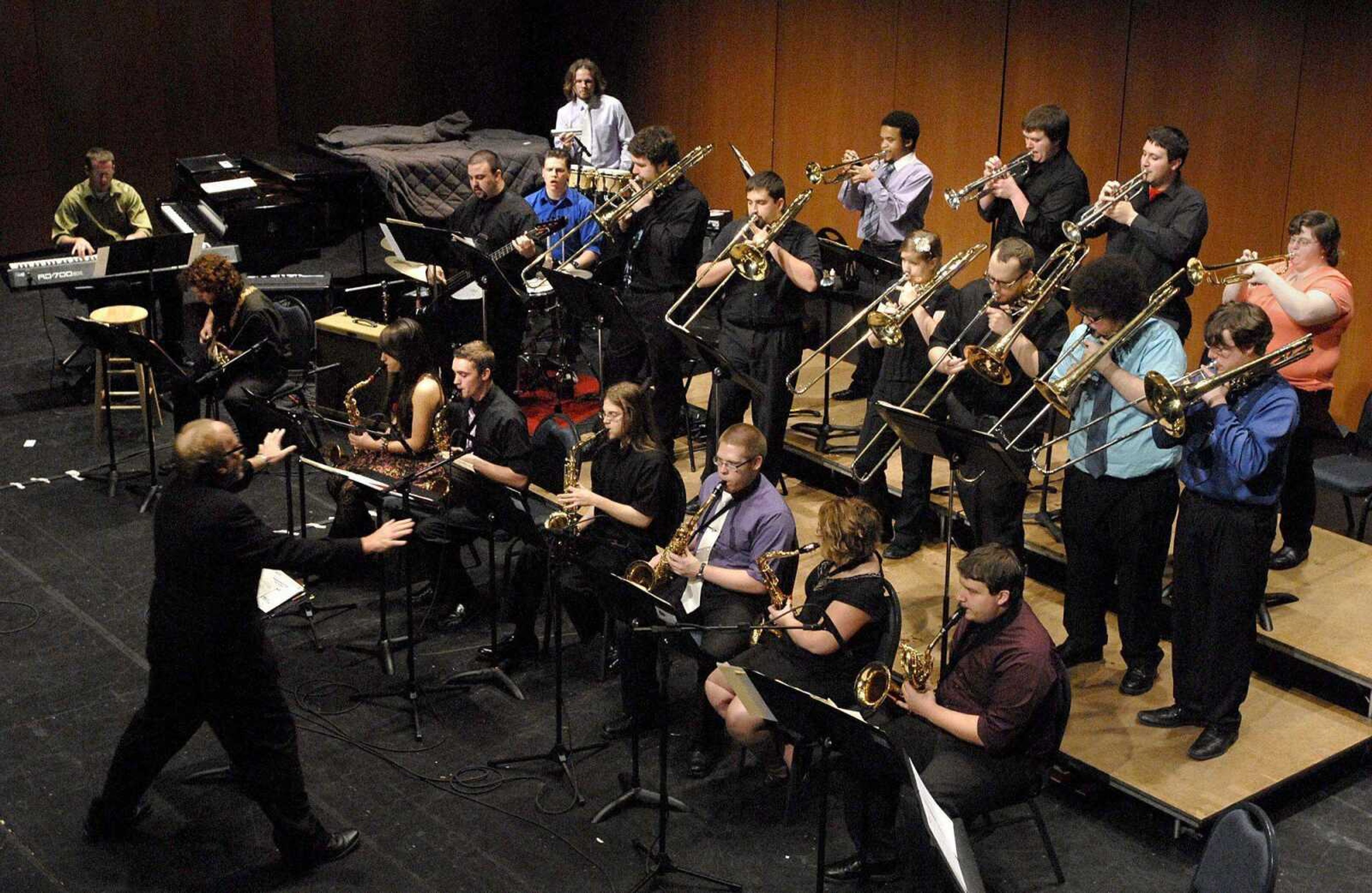 Robert Conger conducts the jazz lab band as they perform Carl Strommen's "Sausalito Strut" to a crowd of 140 Thursay, May 5, 2011 in the Donald C. Bedell Performance Hall on the River Campus of Southeast Missouri State University. (Laura Simon)