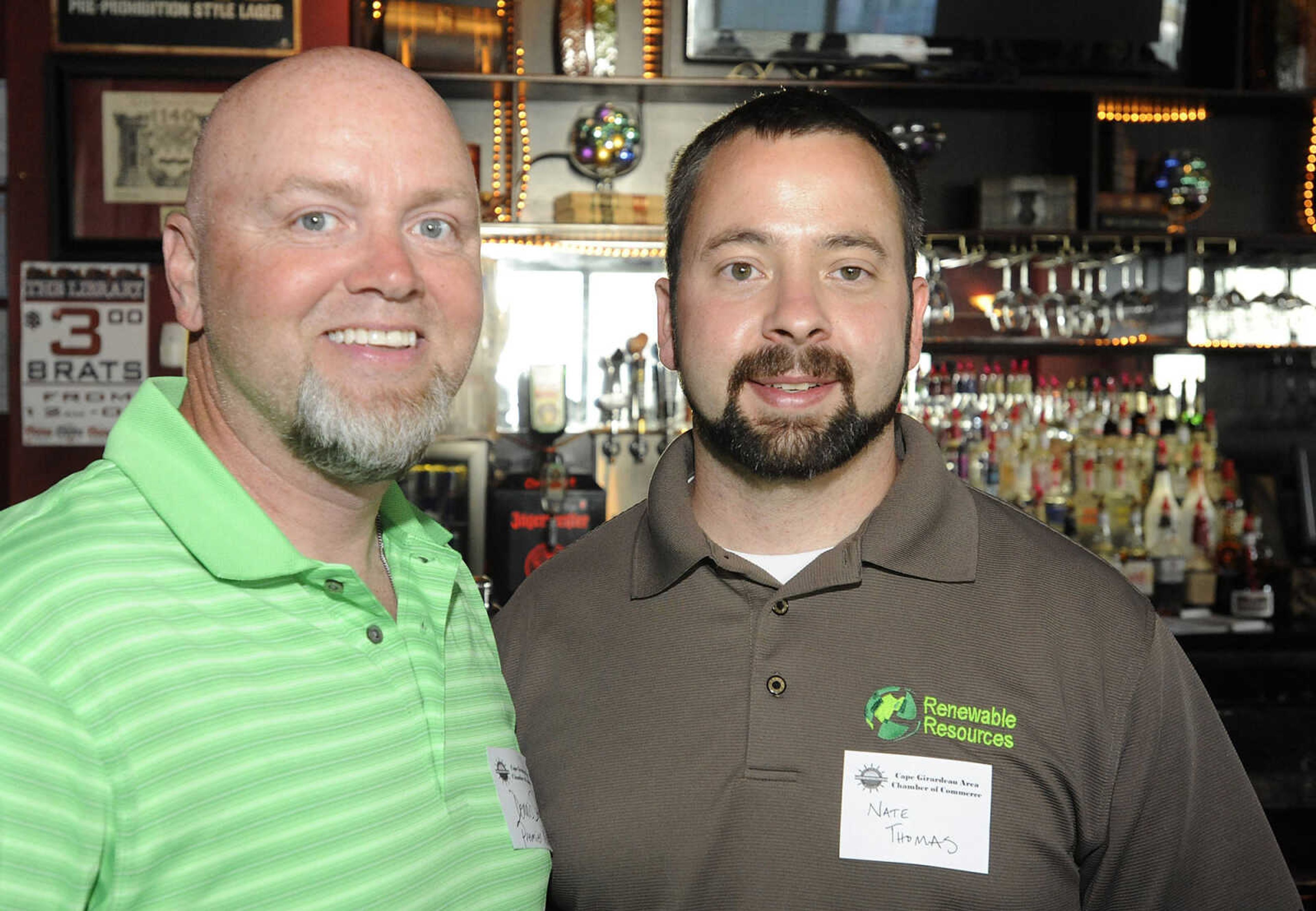 Dennis Sanders, of Premier Rehab, left, and Nate Thomas, of Renewable Resources, during the Cape Girardeau Area Chamber of Commerce Business After Hours Tuesday, June 18, at The Library, 10 South Spanish St., in Cape Girardeau.