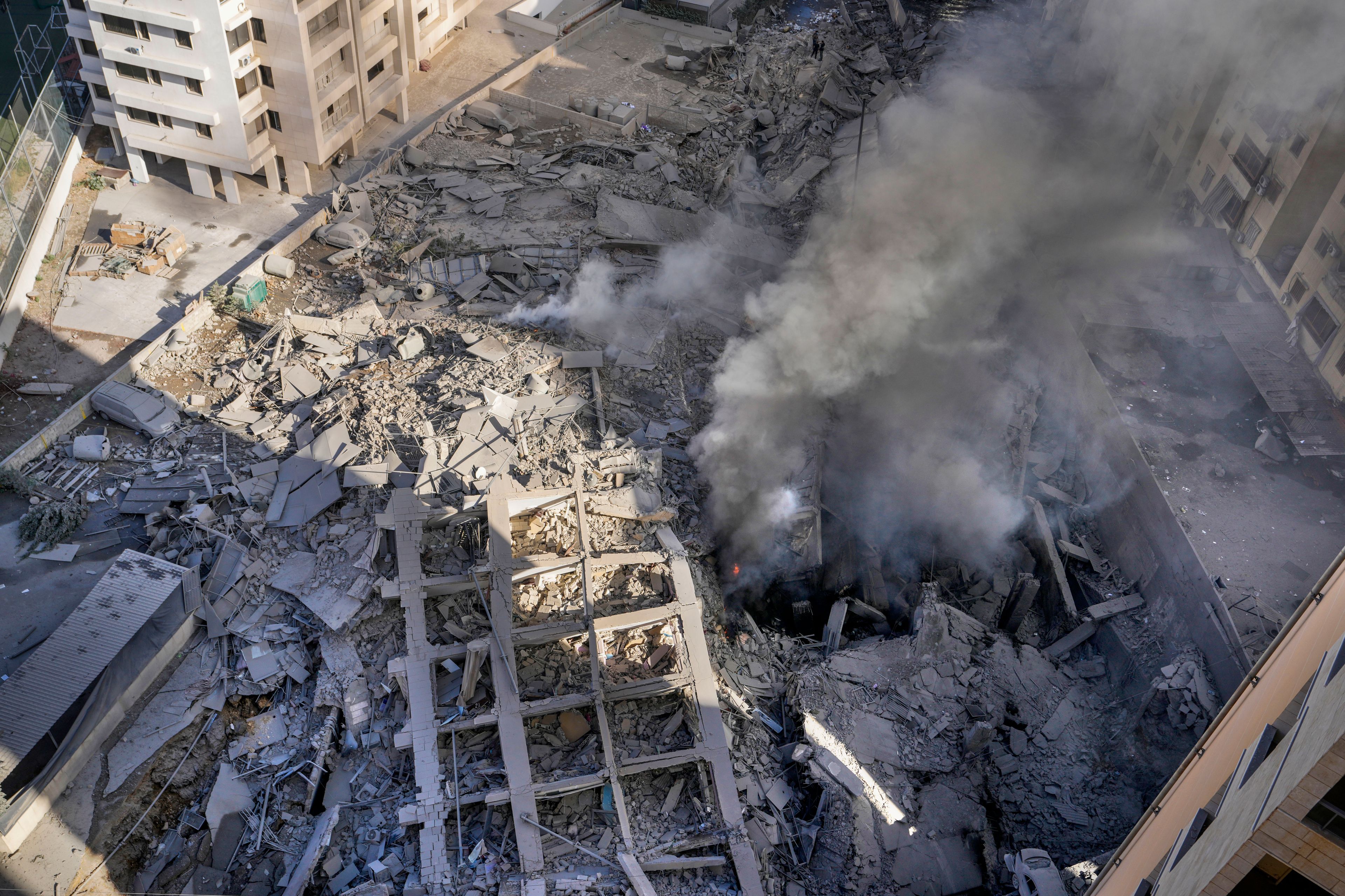 FILE - Smoke rises from the site of an Israeli airstrike in the sourthern suburbs of Beirut's southern suburbs in Lebanon, Wednesday, Oct. 2, 2024. (AP Photo/Hassan Ammar, File)