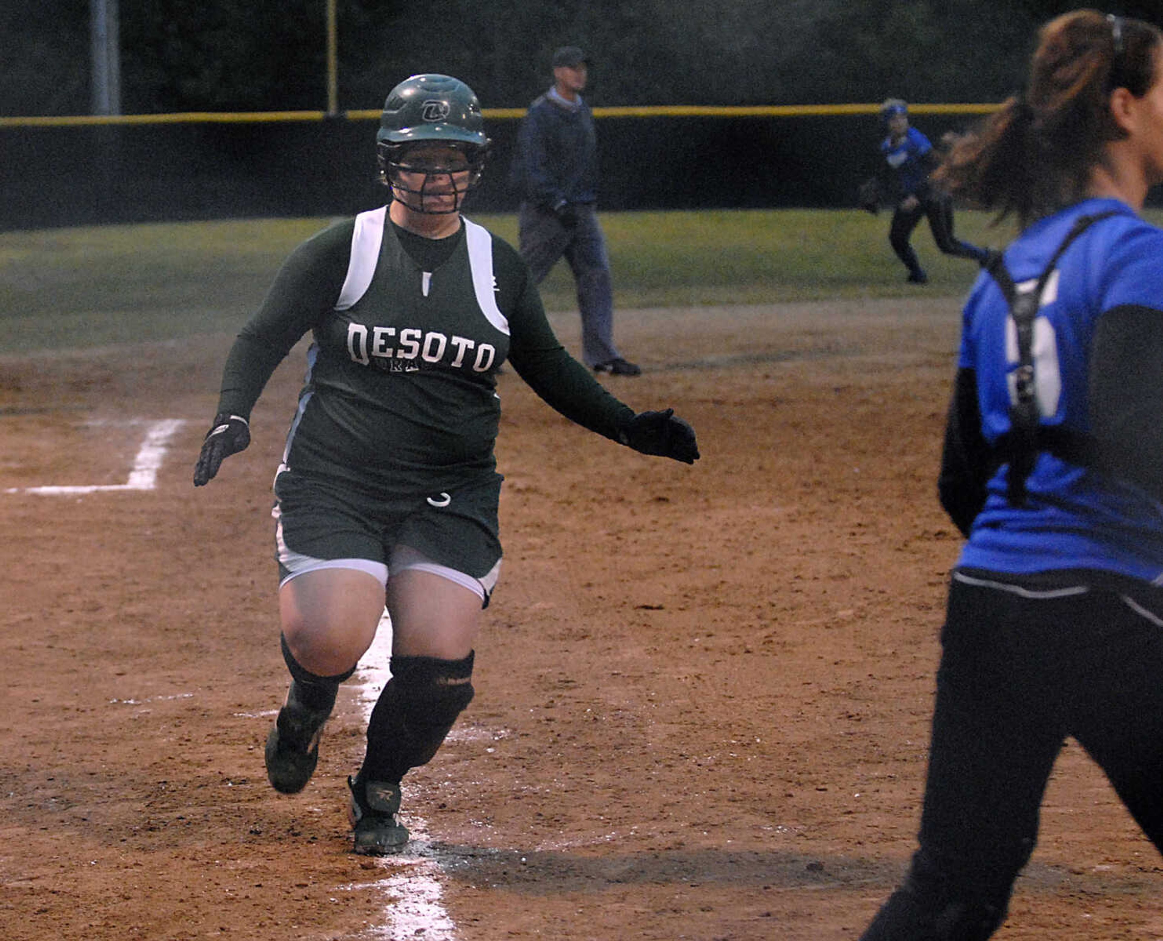 KIT DOYLE ~ kdoyle@semissourian.com
DeSoto's Caitlin Polley comes in to score in the fifth inning Thursday, October 15, 2009, in Poplar Bluff.