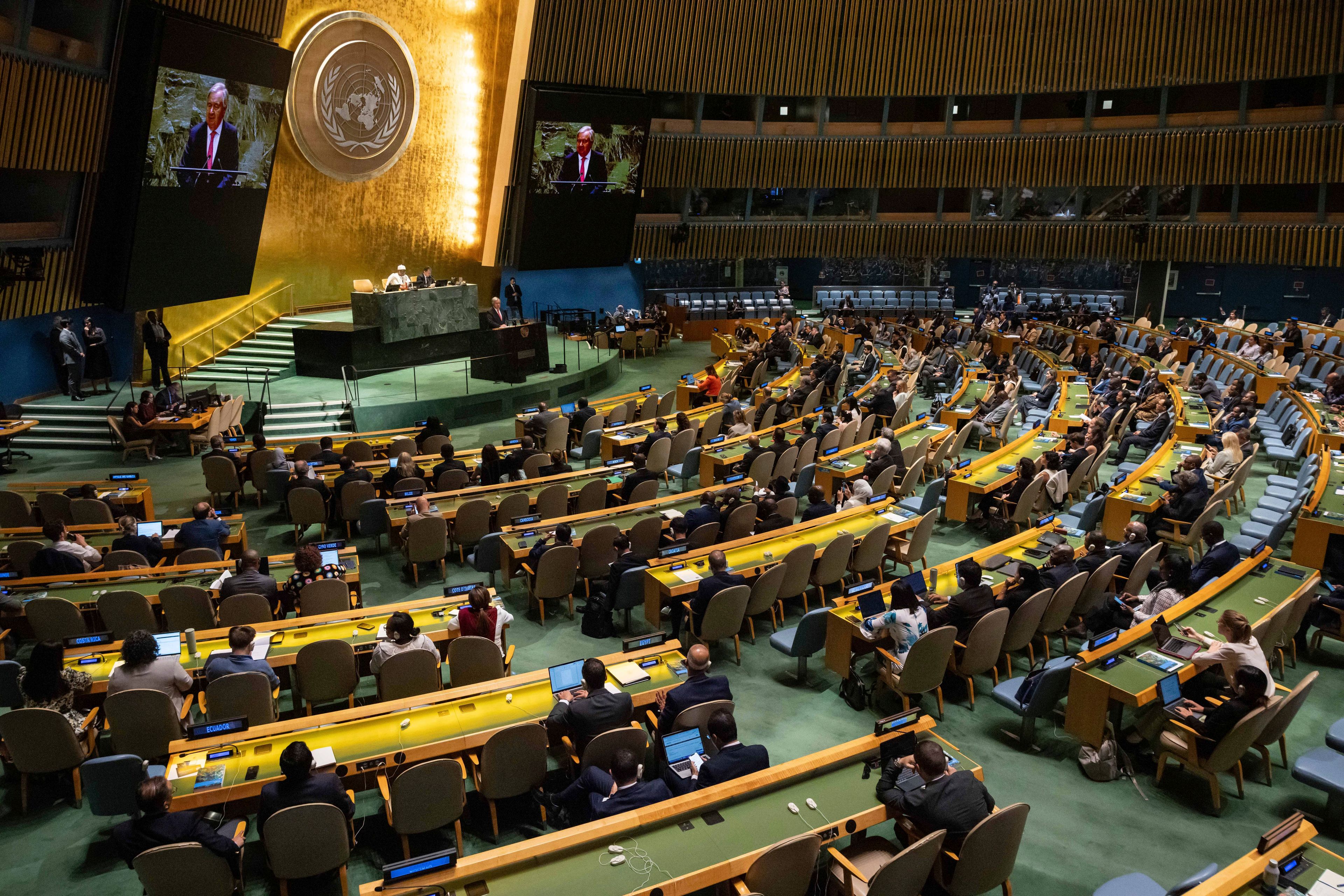 António Guterres, United Nations Secretary-General, speaks during the 79th session of the United Nations General Assembly, Tuesday, Sept. 10, 2024. Cameroon’s former Prime Minister Philemon Yang, seated behind Guterres, took over the presidency of the U.N. General Assembly on Tuesday. (AP Photo/Yuki Iwamura)