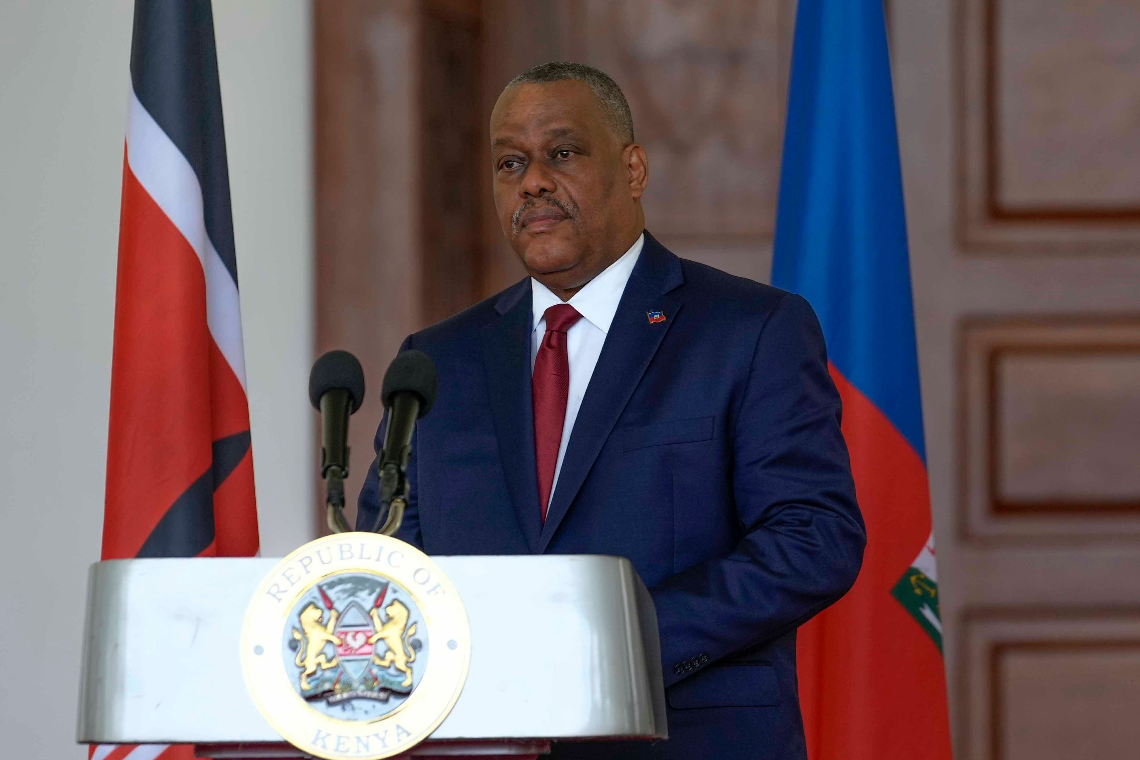 FILE - Haiti Prime Minister Garry Conille speaks during a joint press conference with Kenya's President William Ruto at the State House in Nairobi, Kenya, Oct. 11, 2024. (AP Photo/Brian Inganga, File)