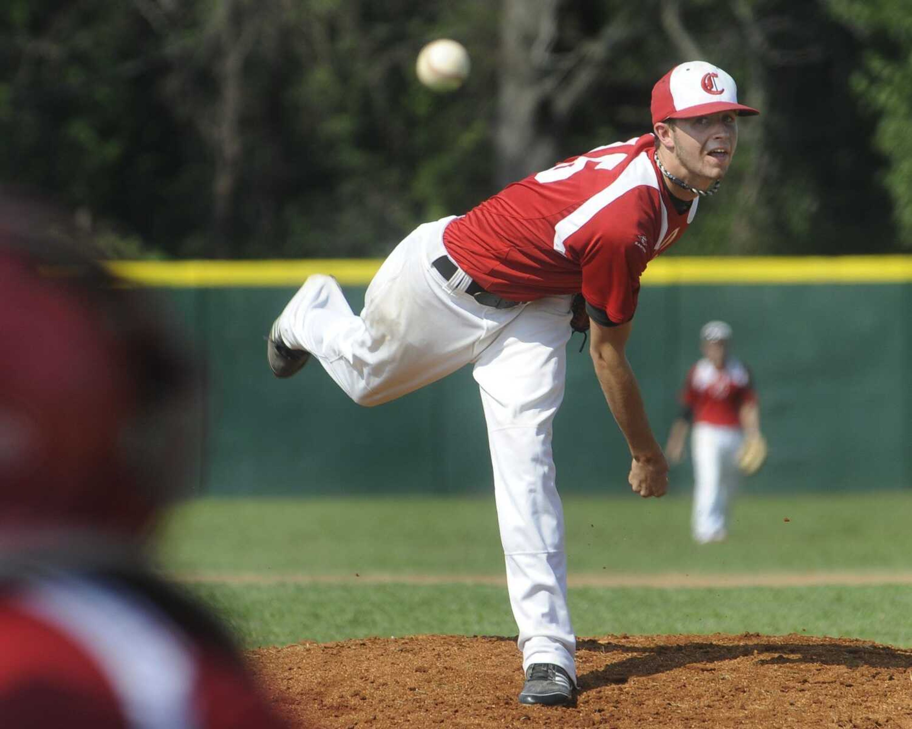 Chaffee starter Andrew Dooley delivers to an Iowa batter during the first inning in the Midwest Plains Regional Baseball Tournament Saturday, July 23, 2011 in Charleston, Mo. (Fred Lynch)