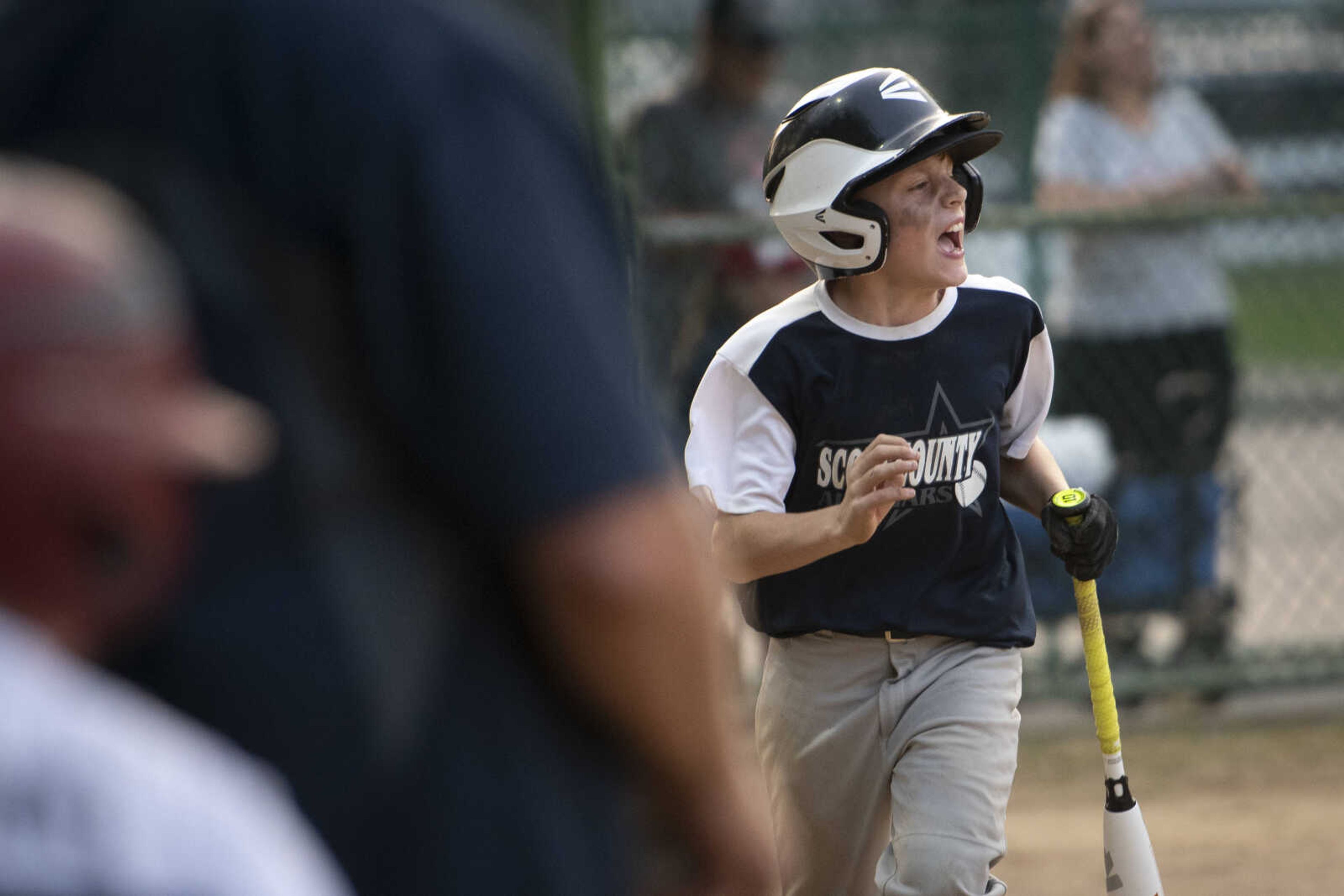 Cooper Bryant of the Scott County All-Stars cheers after a Scott County run while headed back to the dugout during the team's 5-2 victory over the SEMO Cardinals in the championship game of the 2019 Kelso 11U Showdown on Sunday, June 2, 2019, in Kelso.